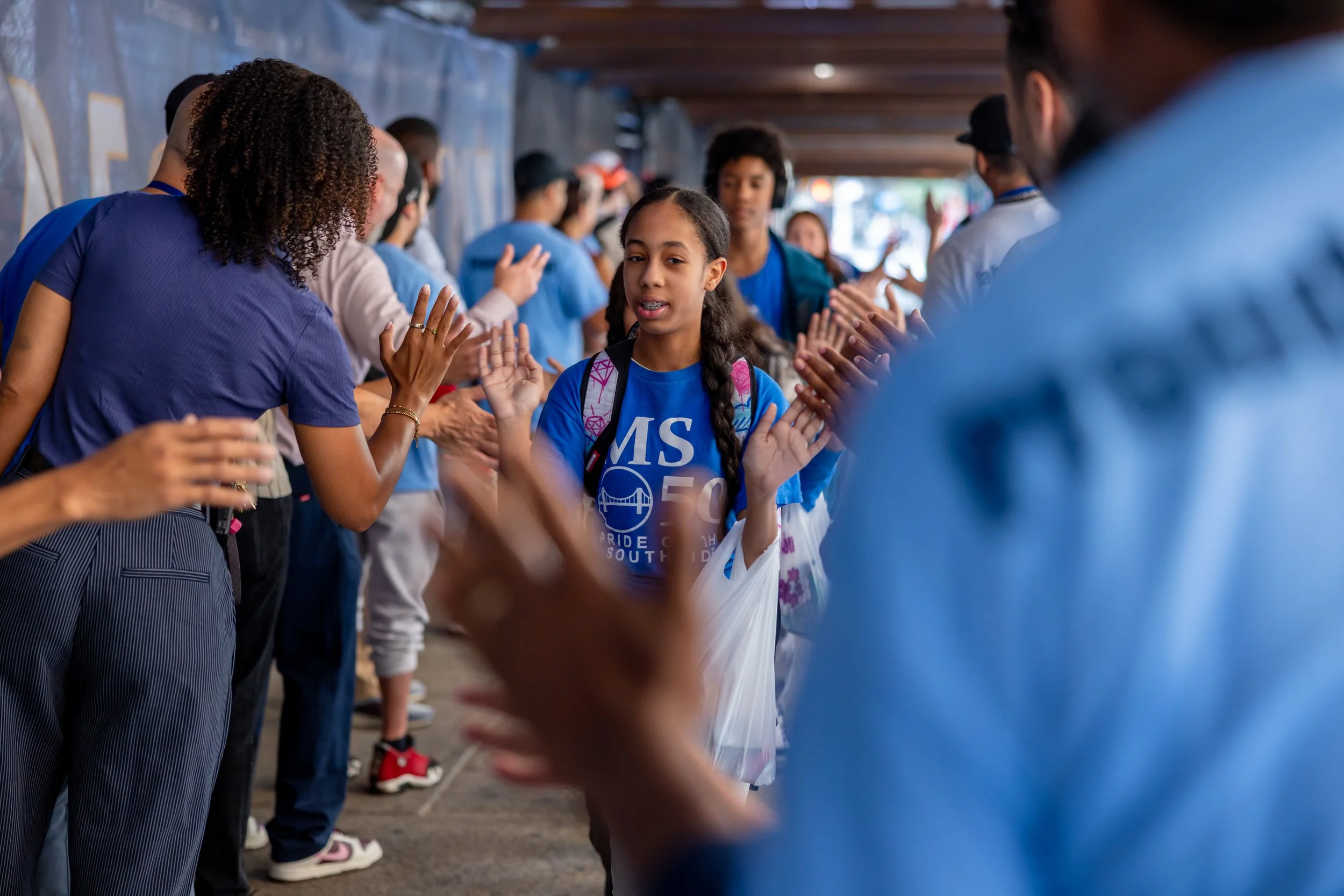 Students get high fives from parents