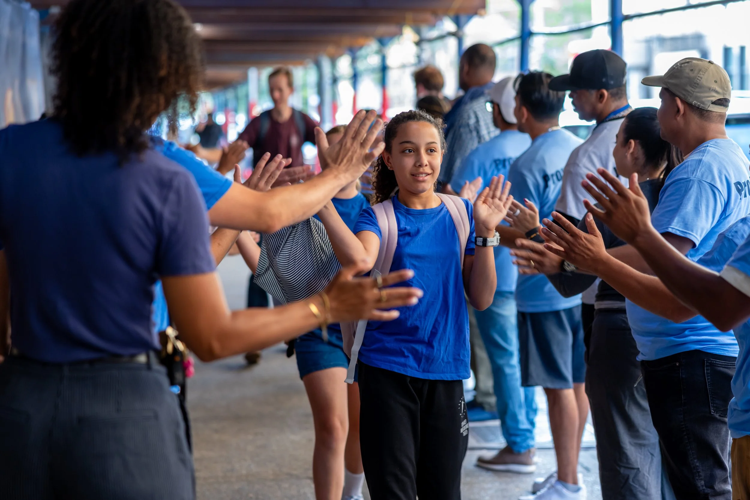 Students get high fives from parents