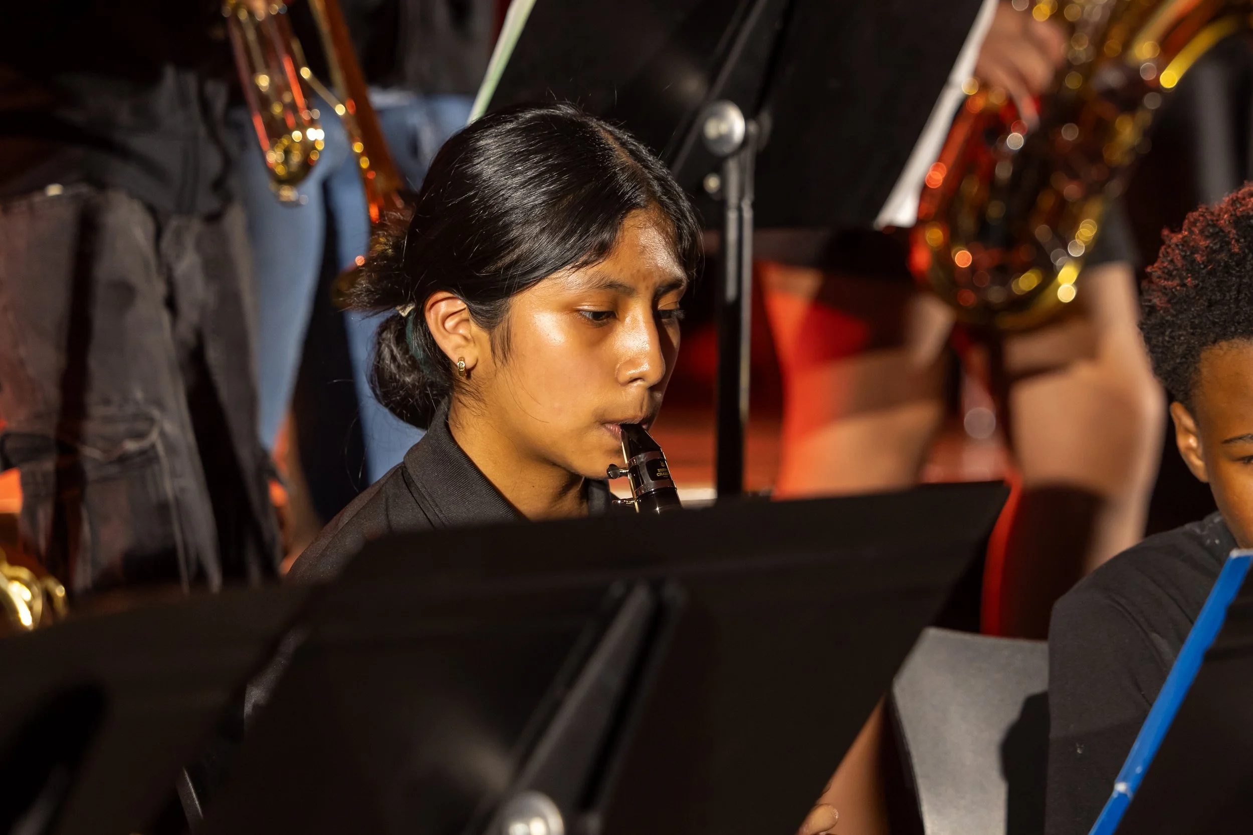 middle school students perform in band concert