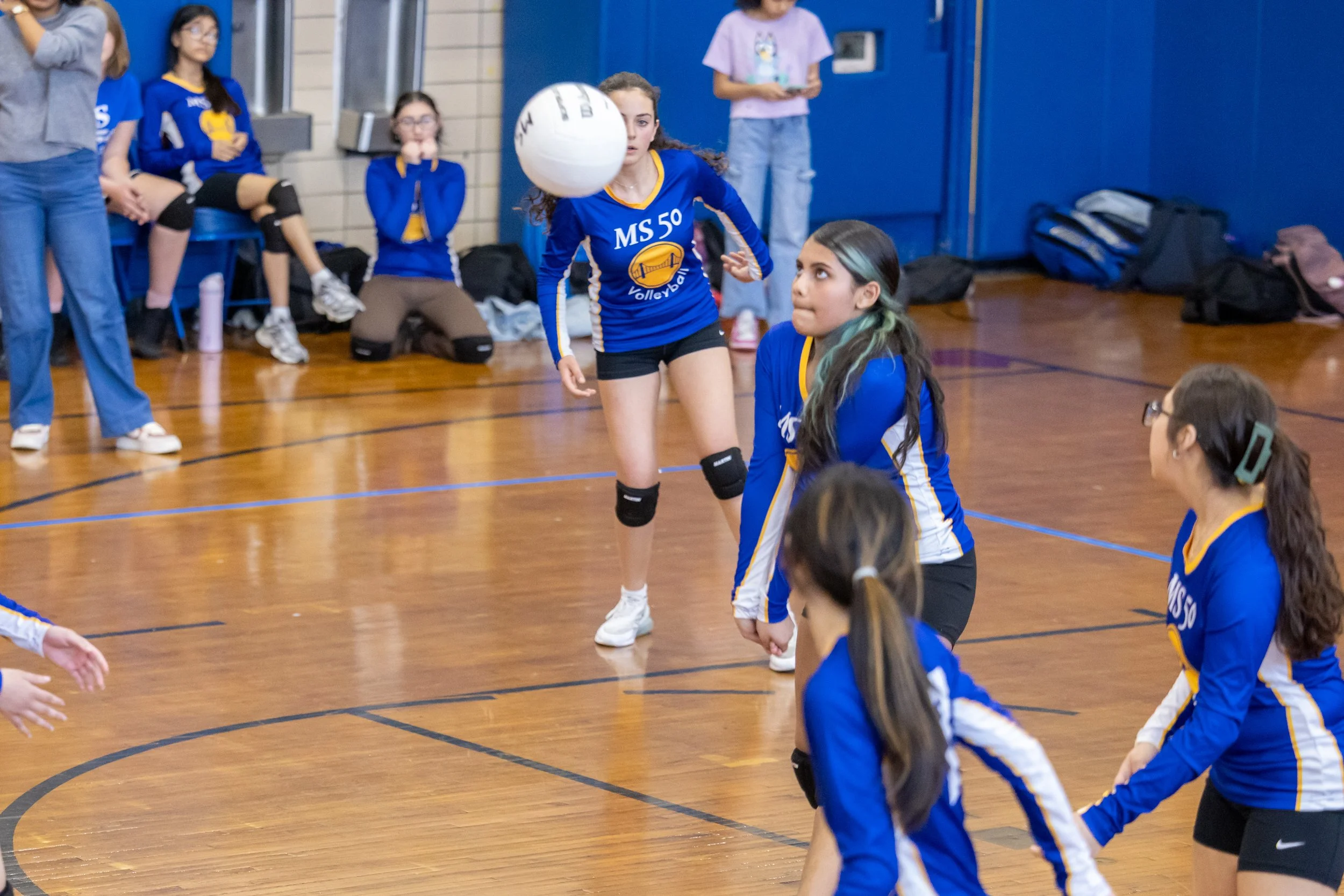 MS 50 students playing volleyball