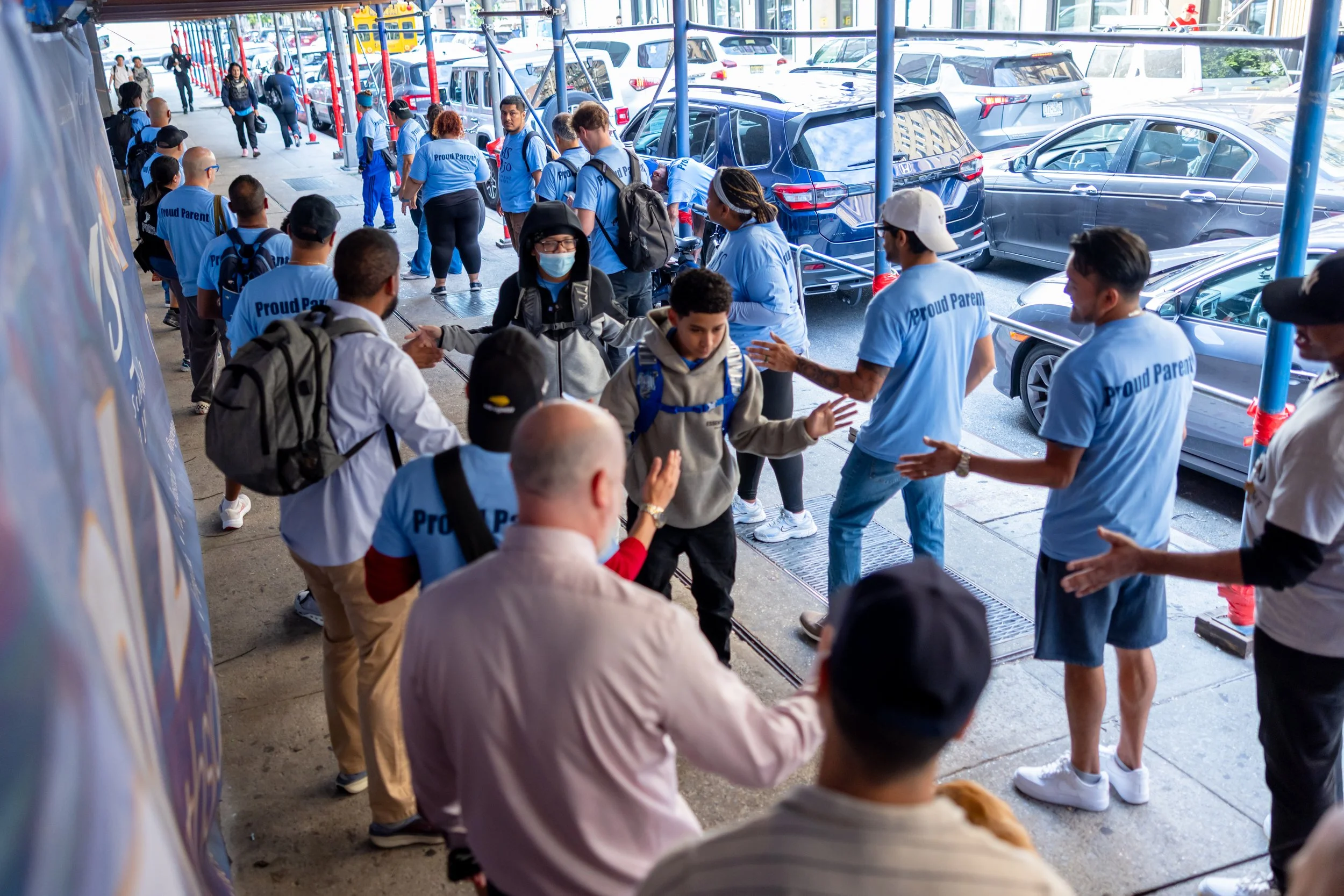 Students get high fives from parents