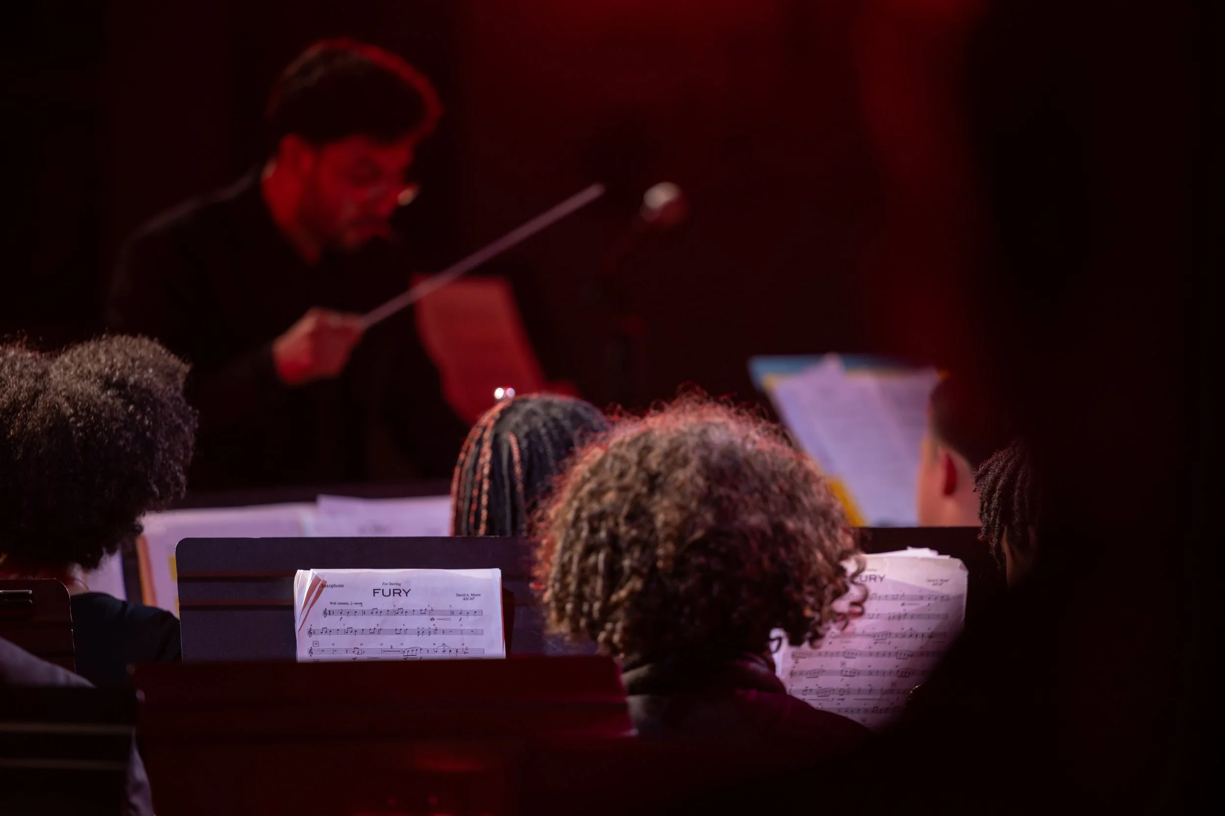middle school students perform in band concert