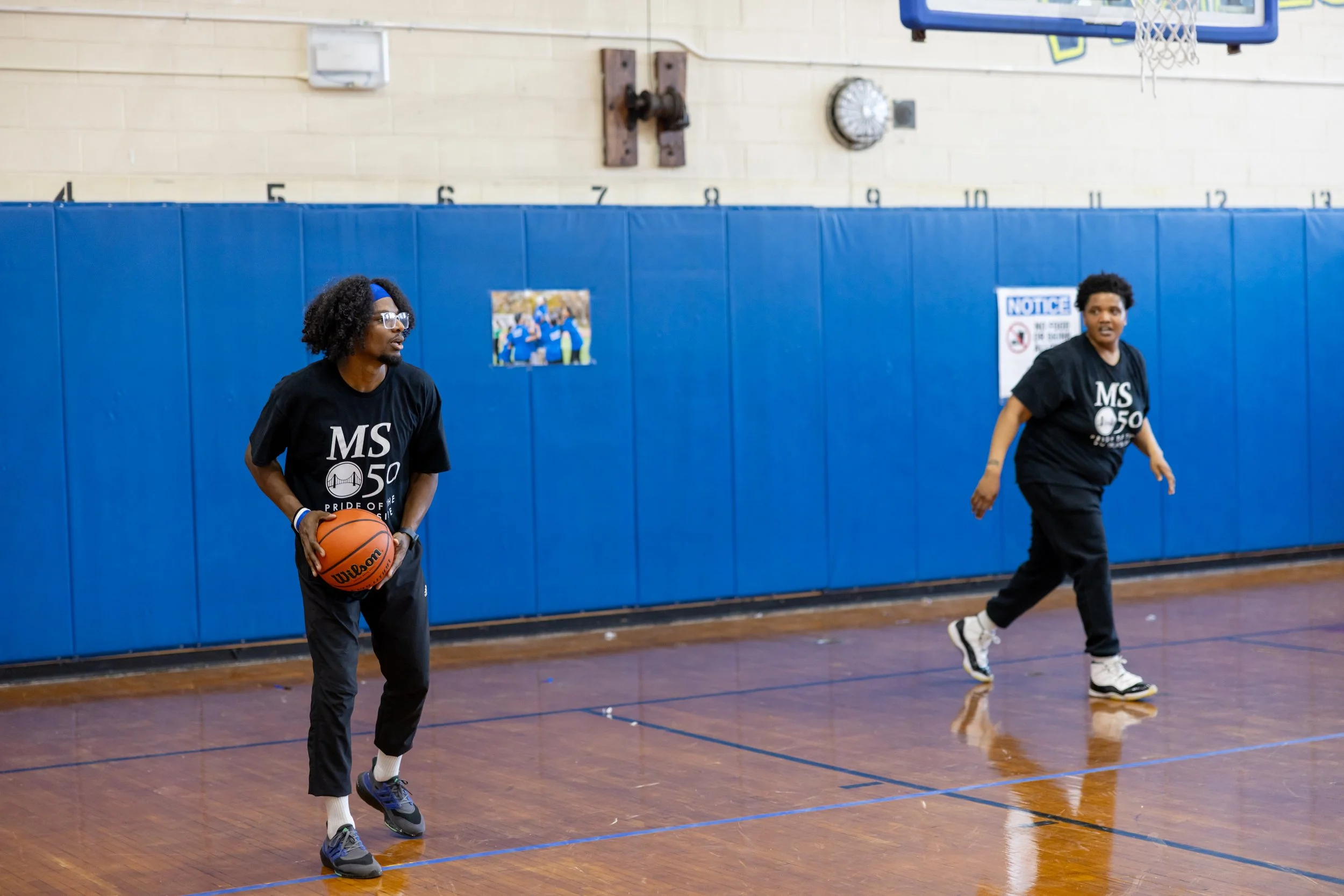 student versus staff basketball game