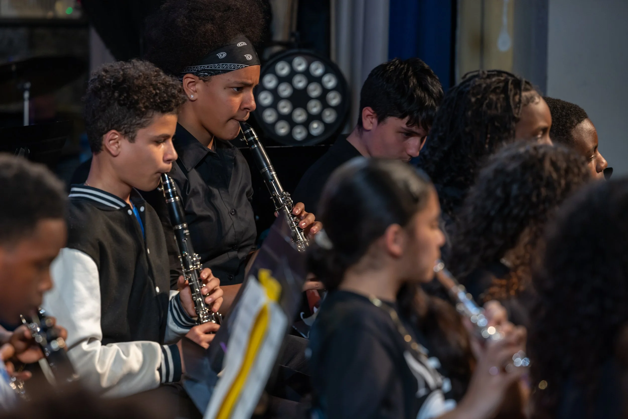 middle school students perform in band concert