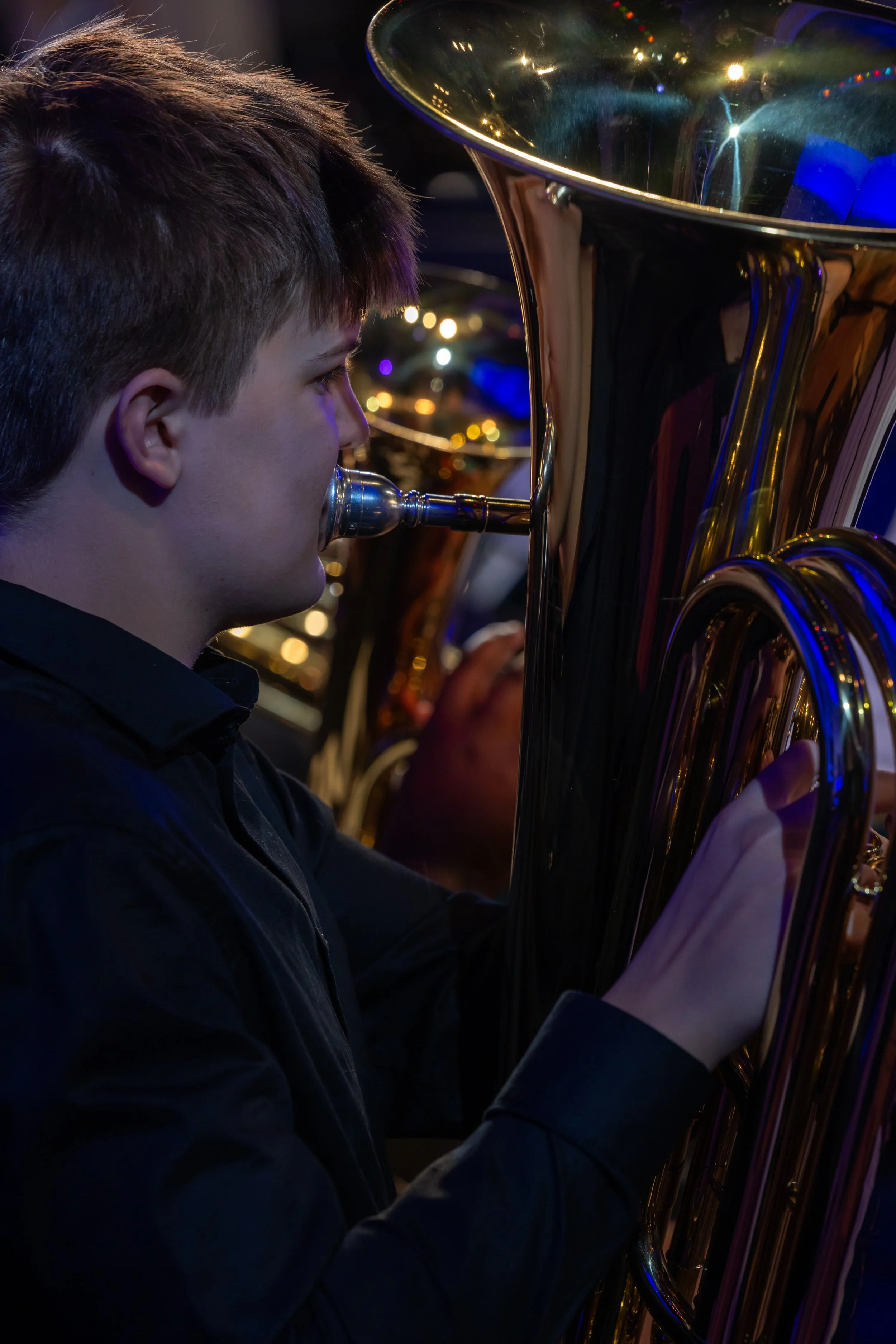 middle school students perform in band concert