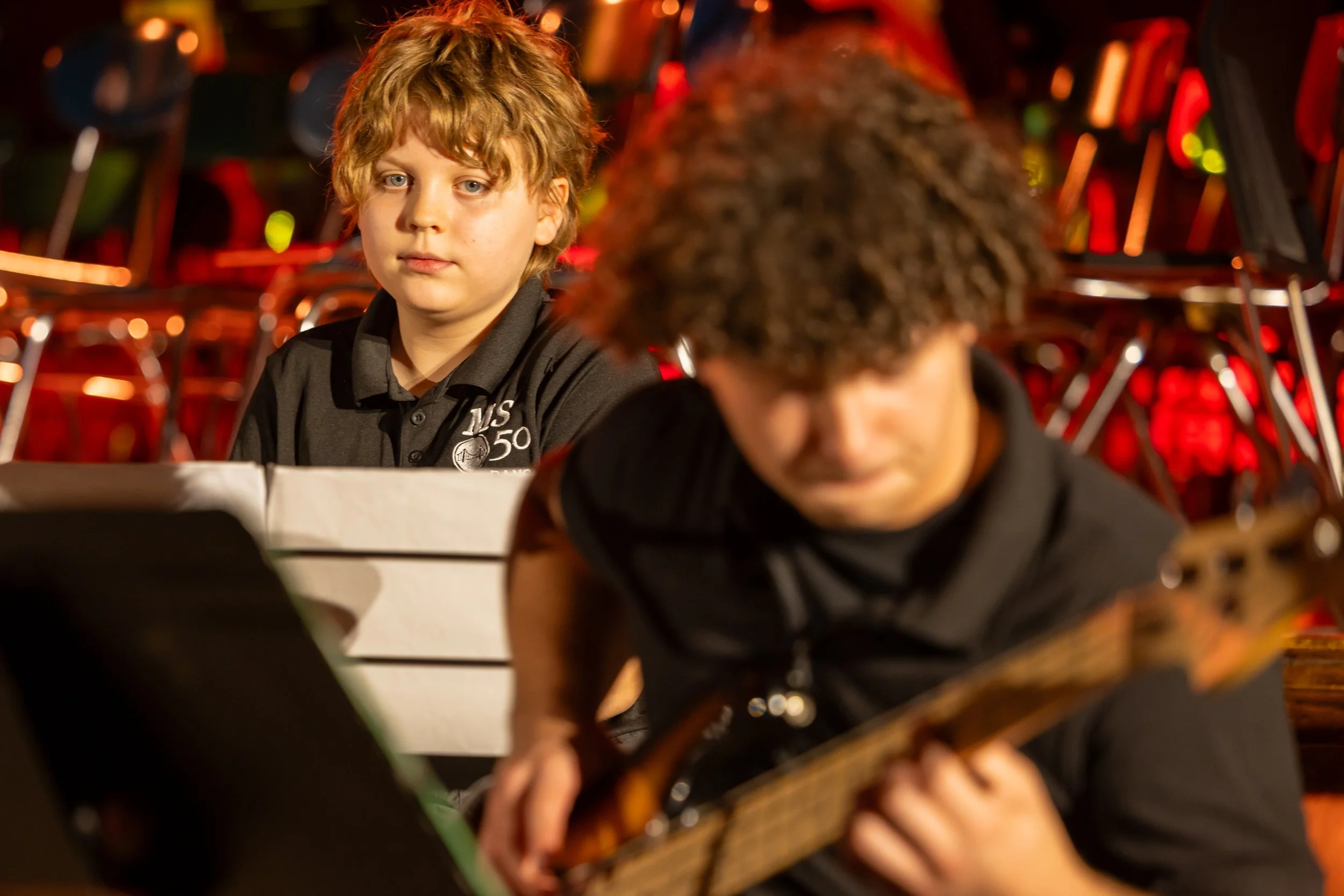 middle school students perform in band concert