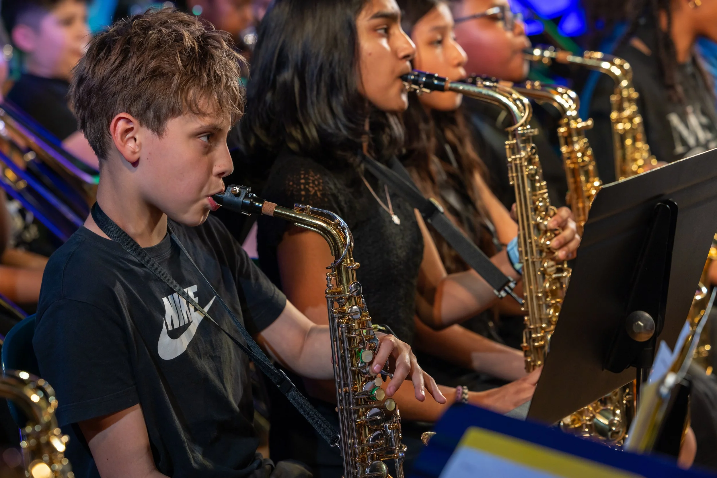 middle school students perform in band concert