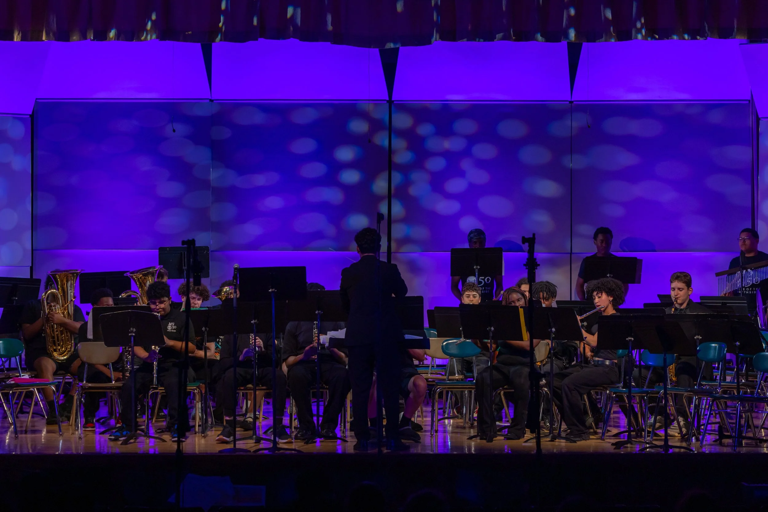 middle school students perform in band concert