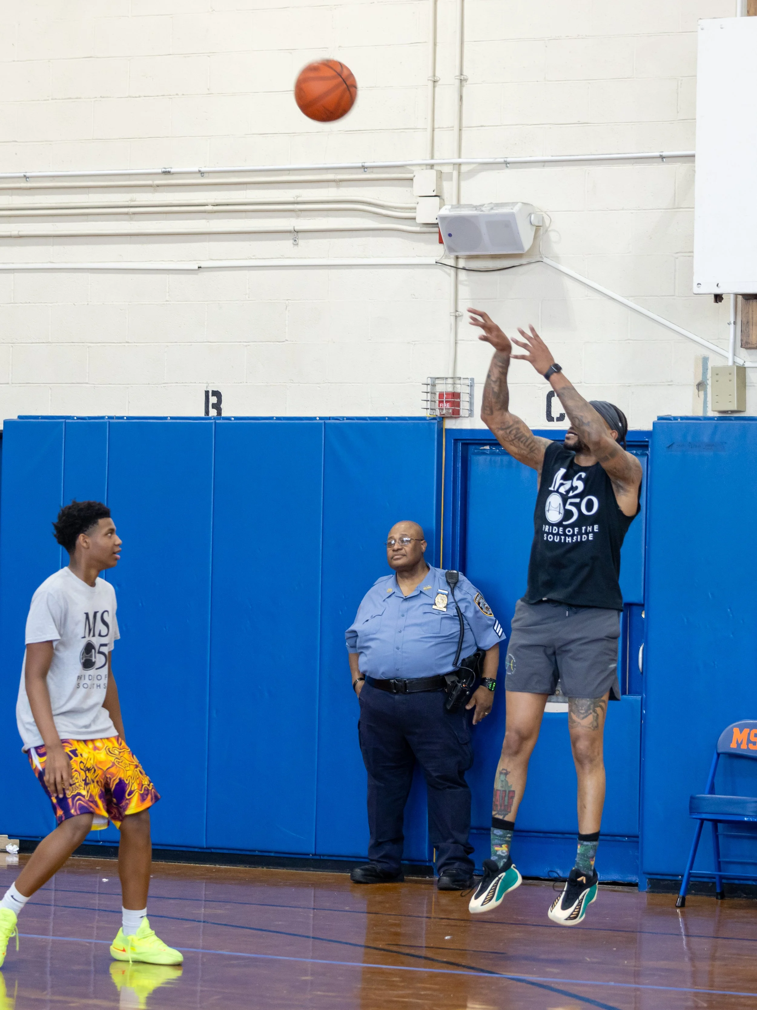 student versus staff basketball game