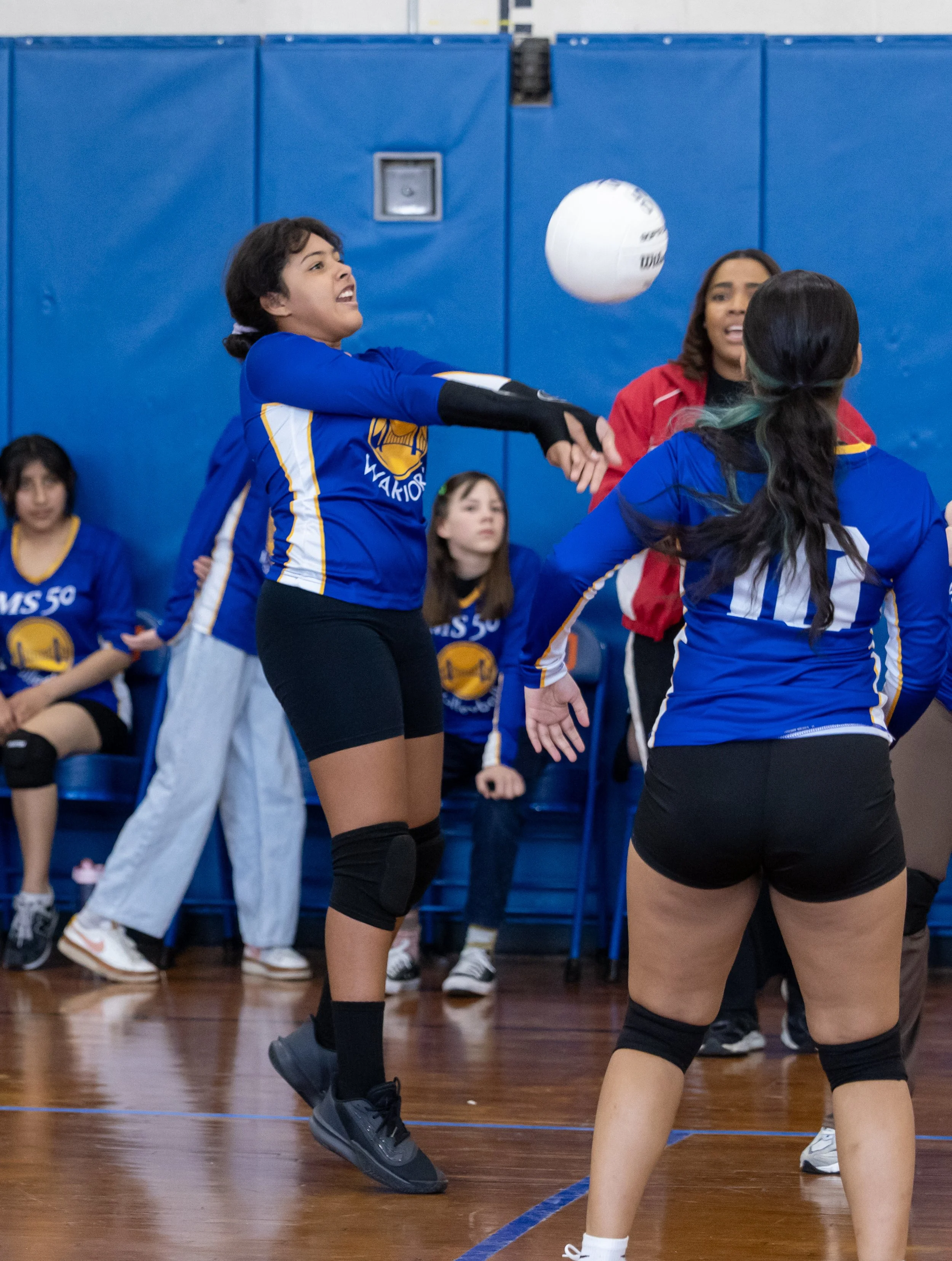 MS 50 students playing volleyball