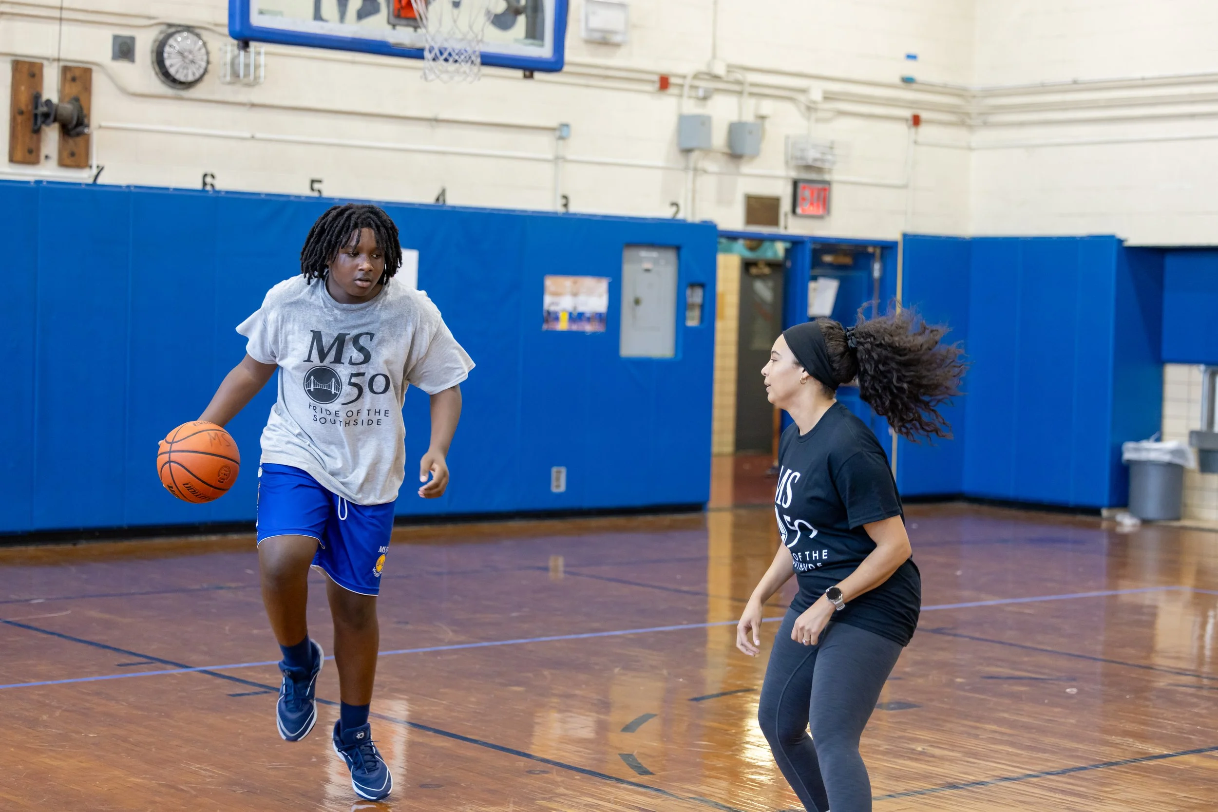 student versus staff basketball game