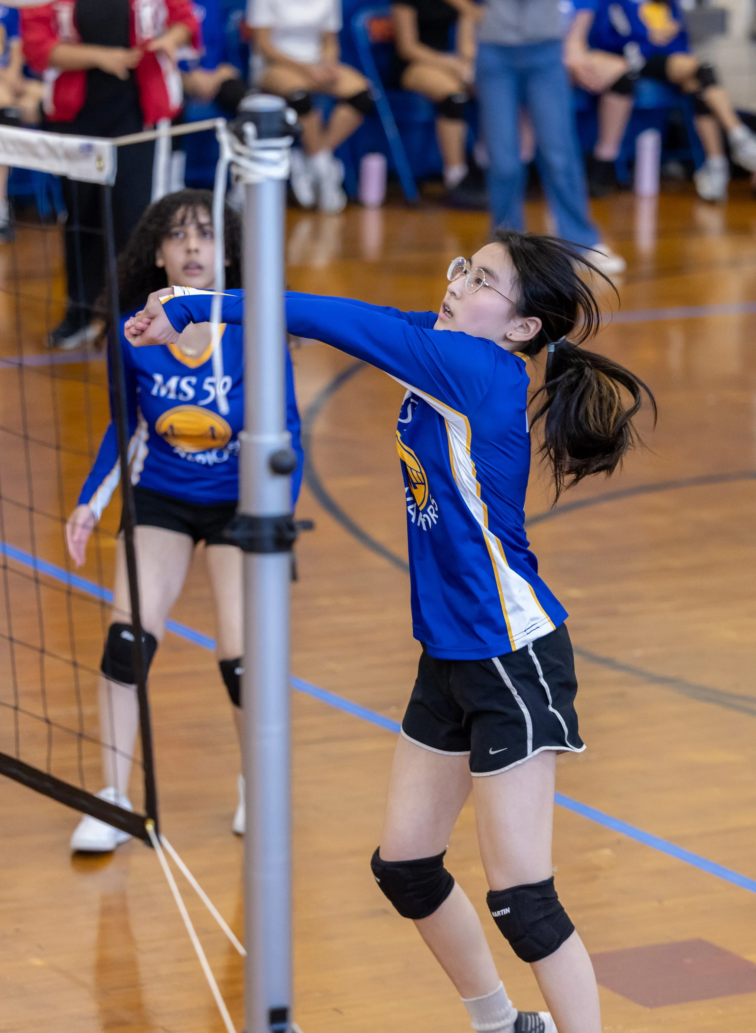MS 50 students playing volleyball