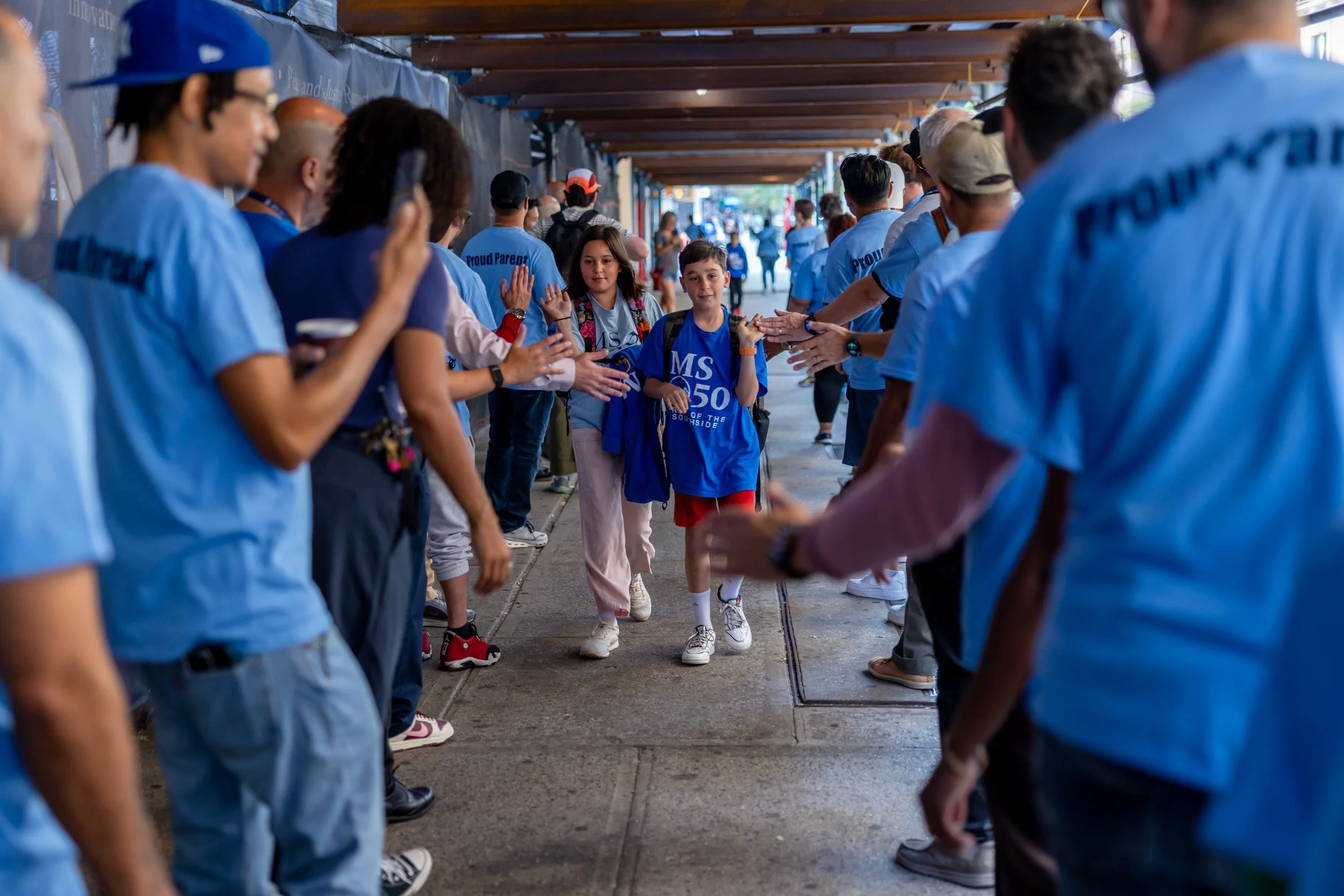Students get high fives from parents