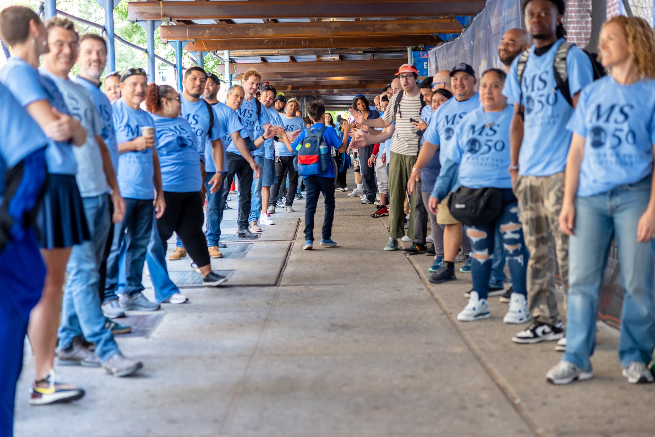Students get high fives from parents