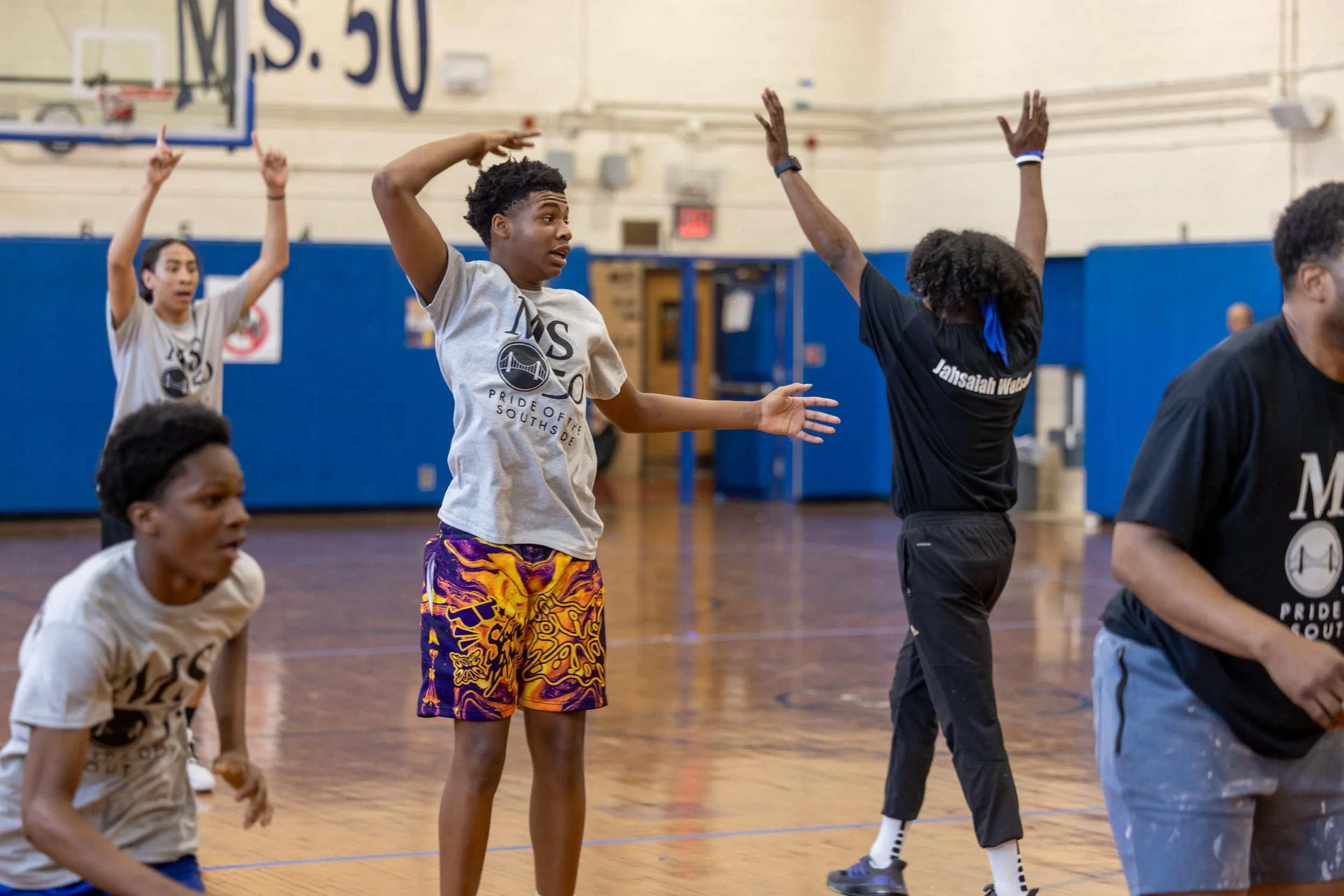 student versus staff basketball game