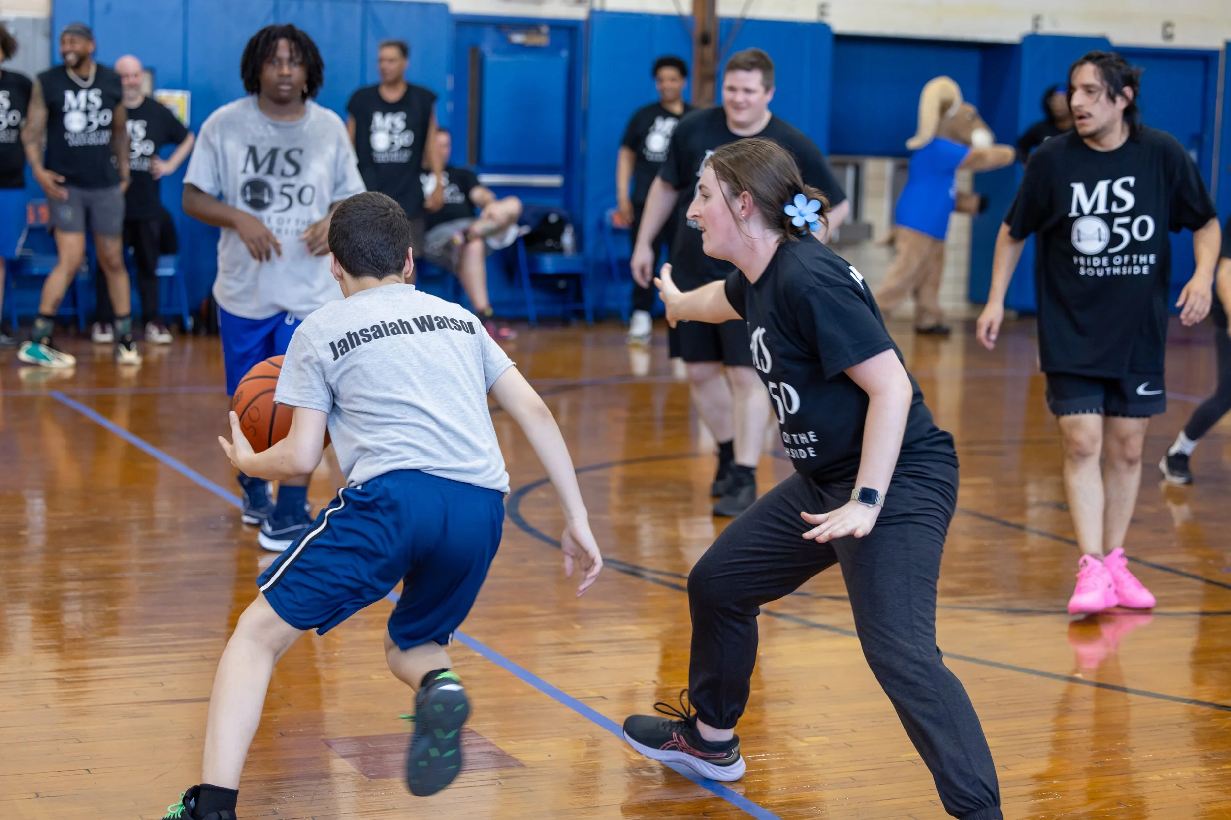 student versus staff basketball game