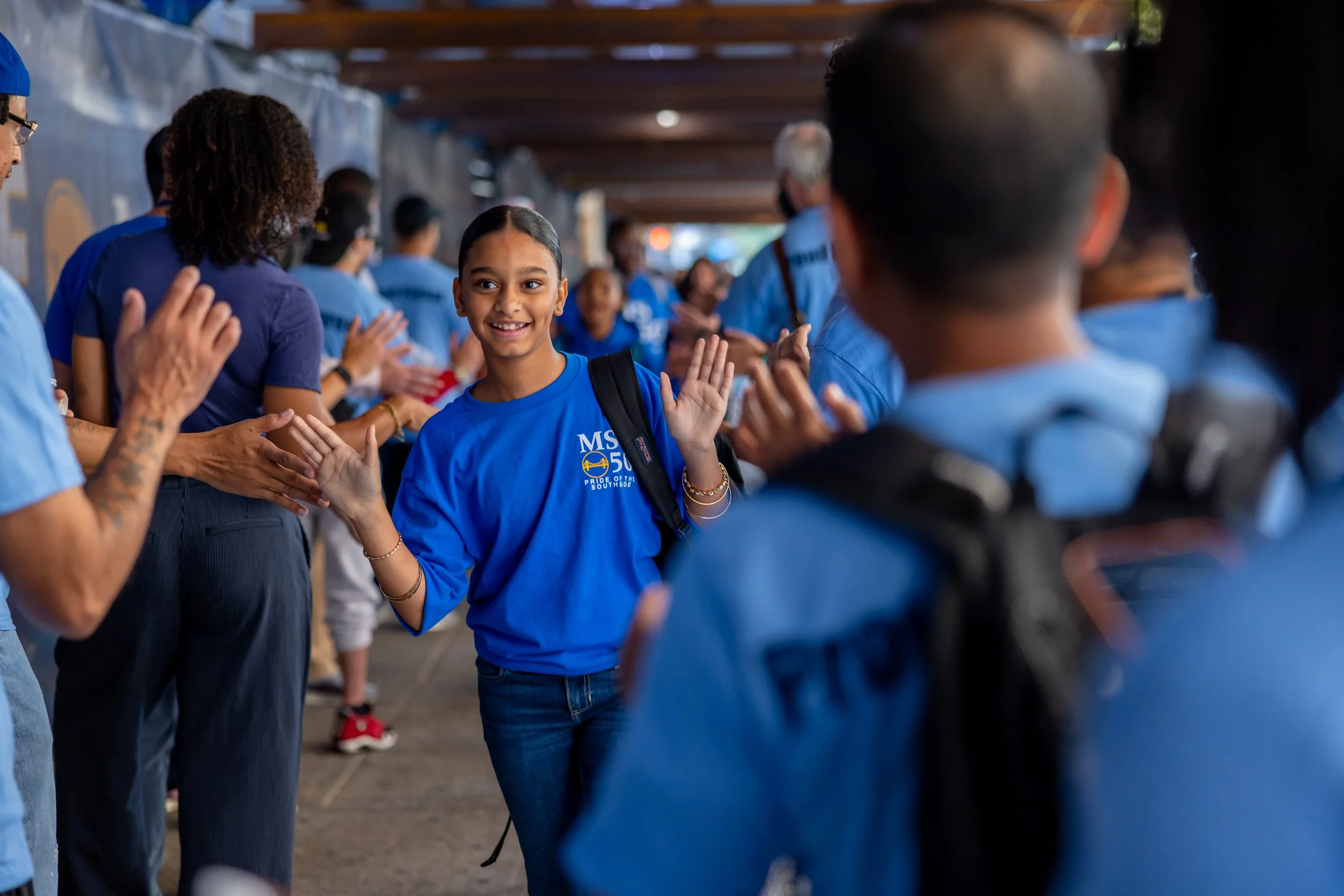 Students get high fives from parents