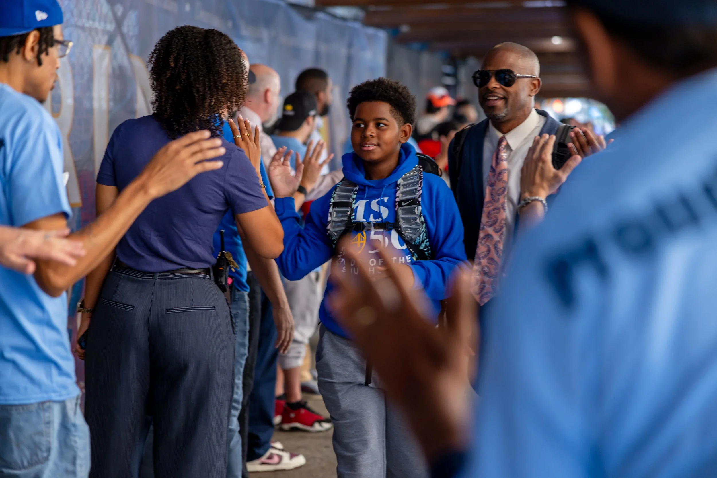 Students get high fives from parents