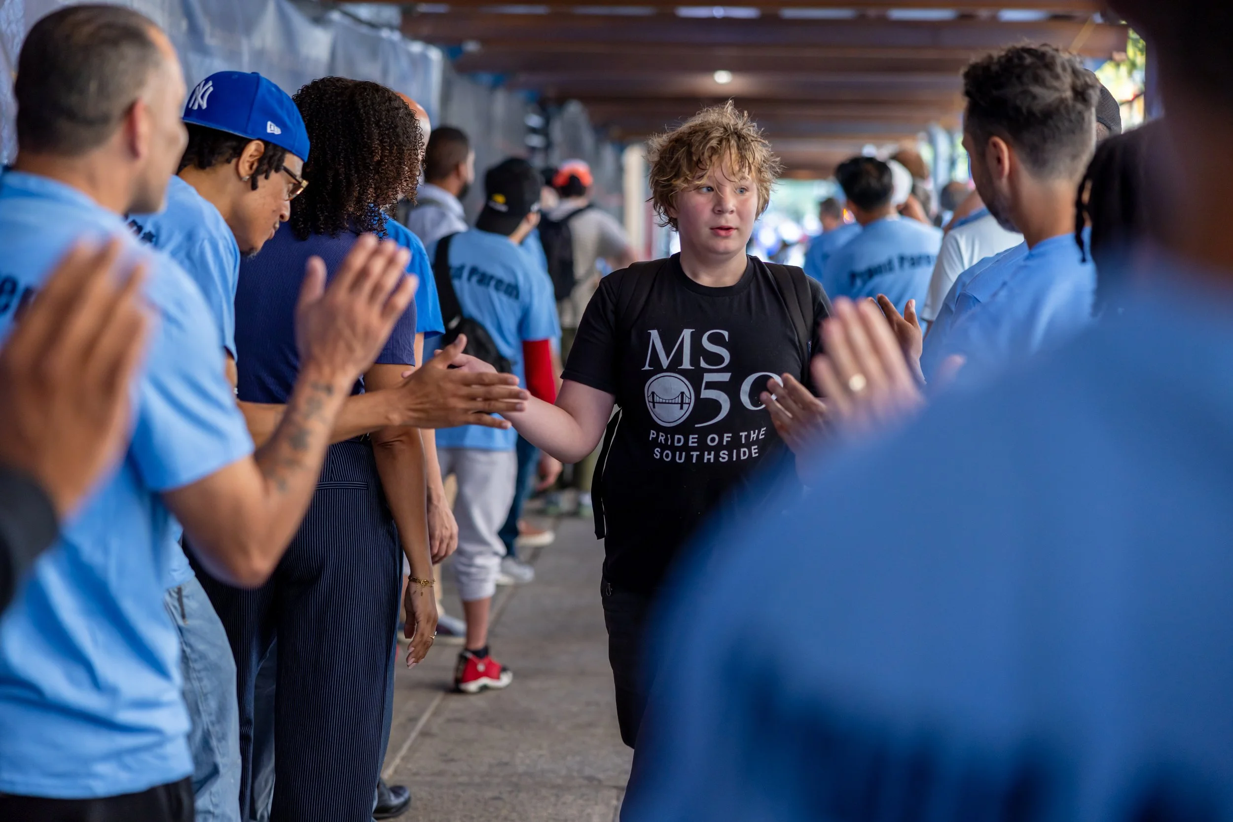 Students get high fives from parents