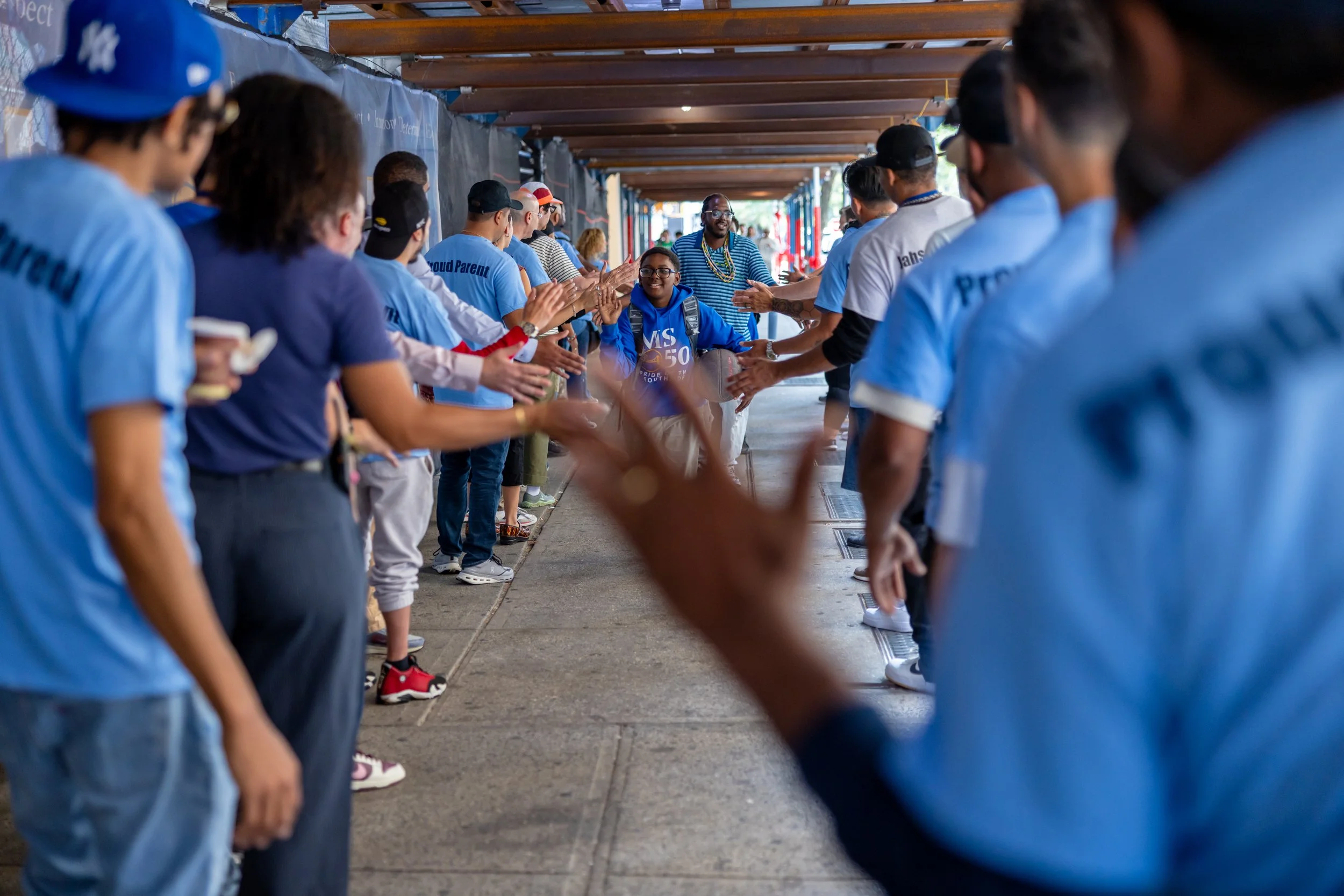 Students get high fives from parents