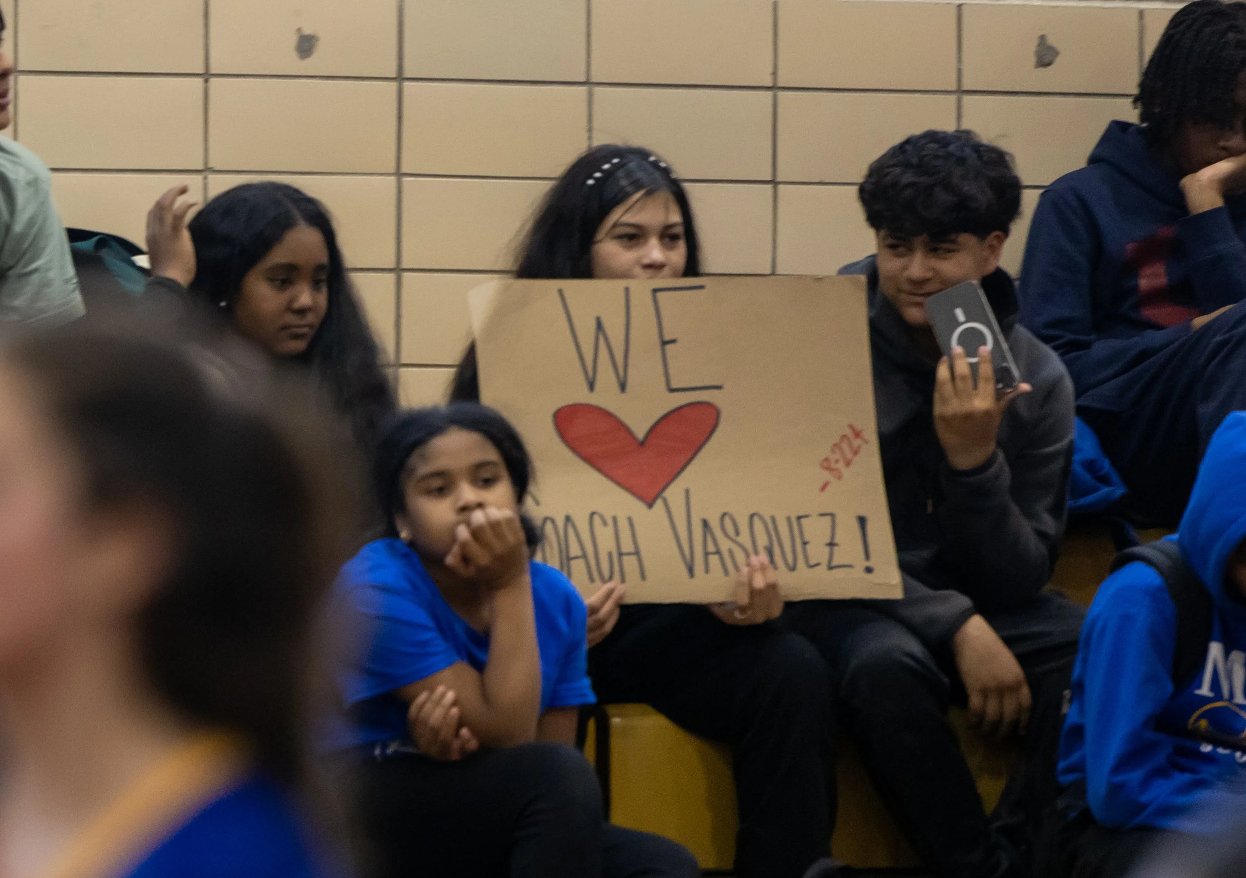 MS 50 students watching volleyball