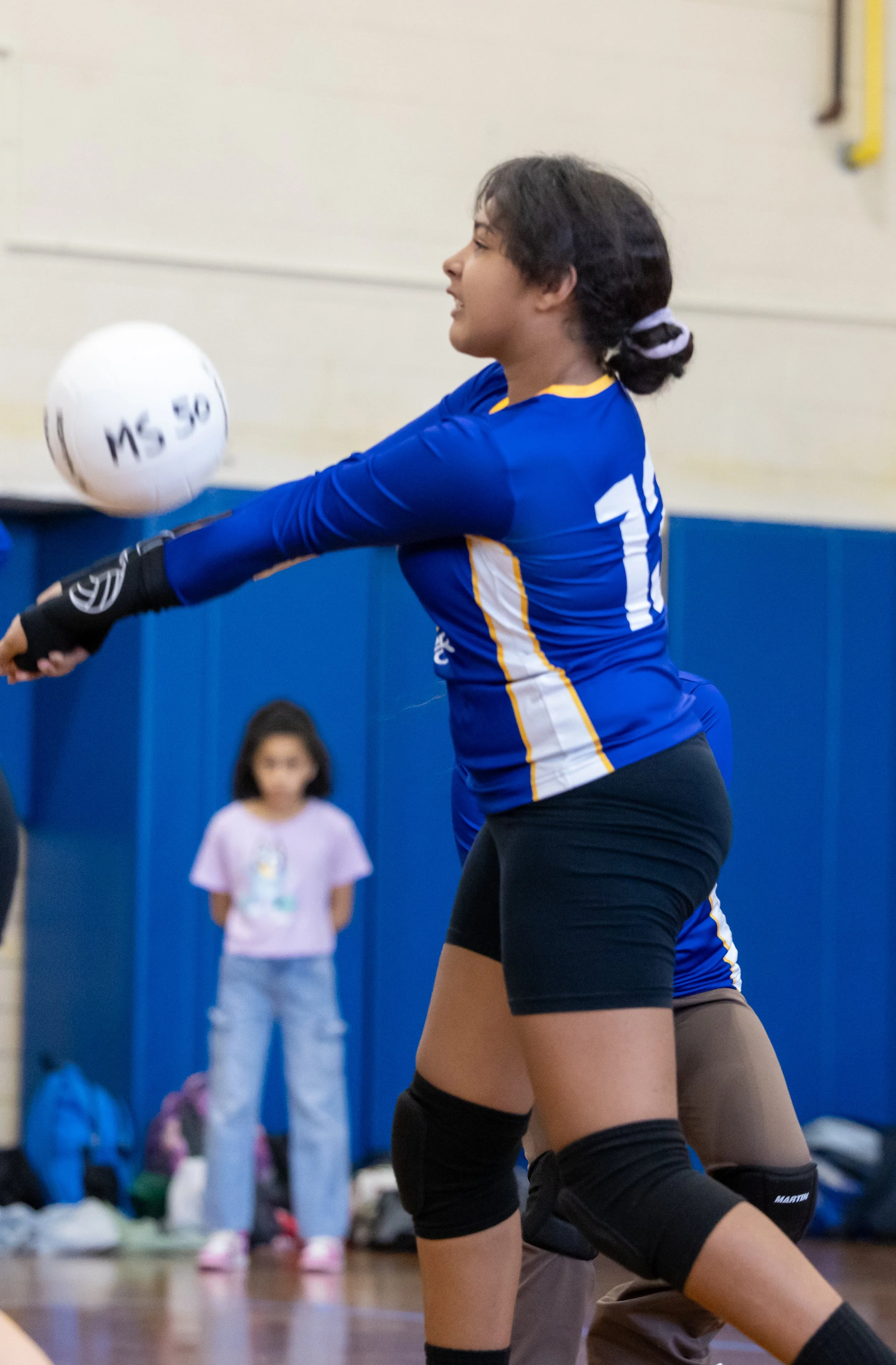 MS 50 students playing volleyball