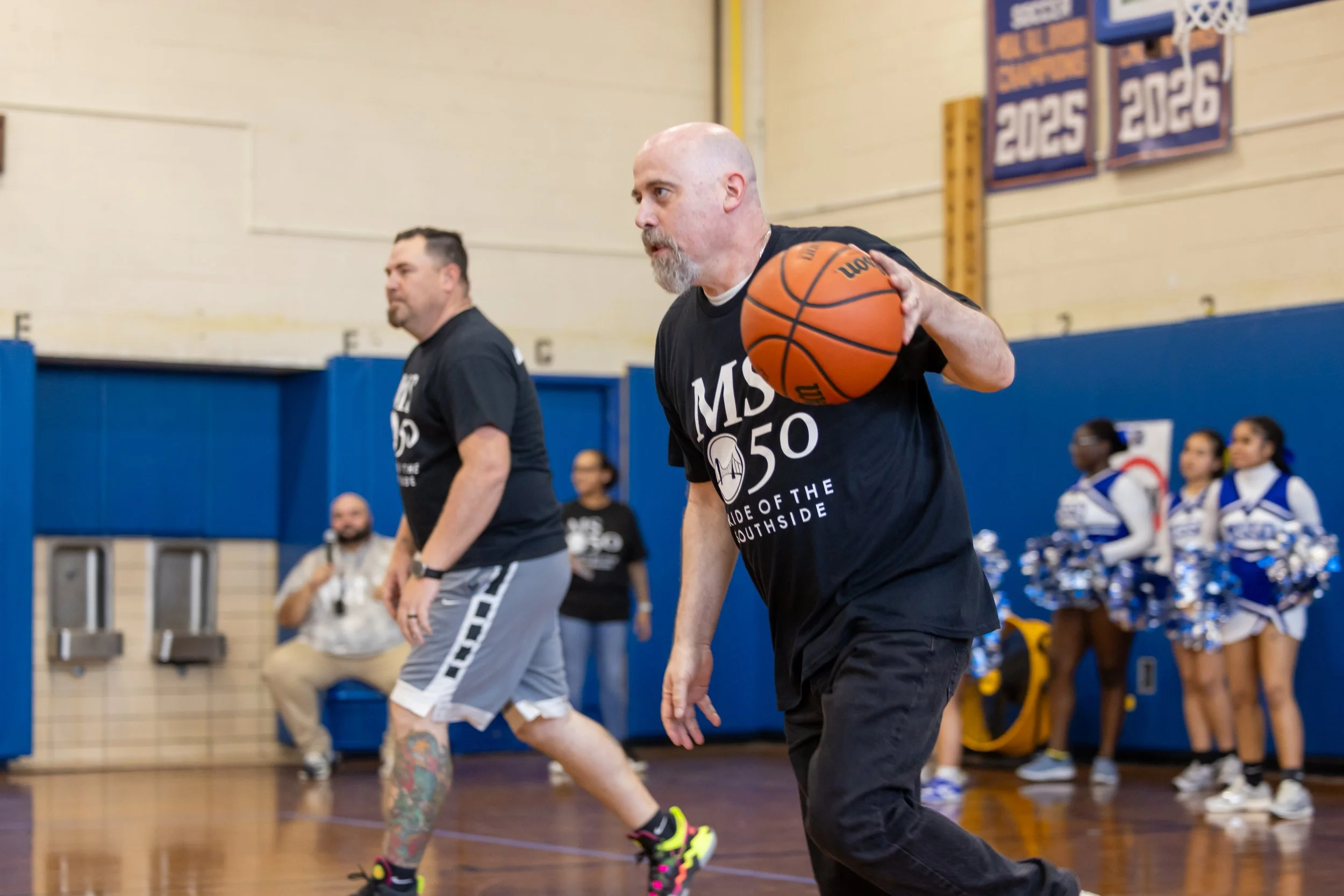 student versus staff basketball game