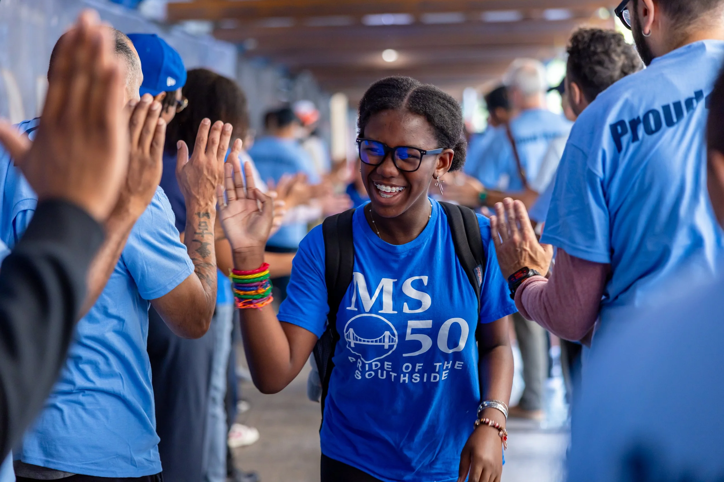 Students get high fives from parents
