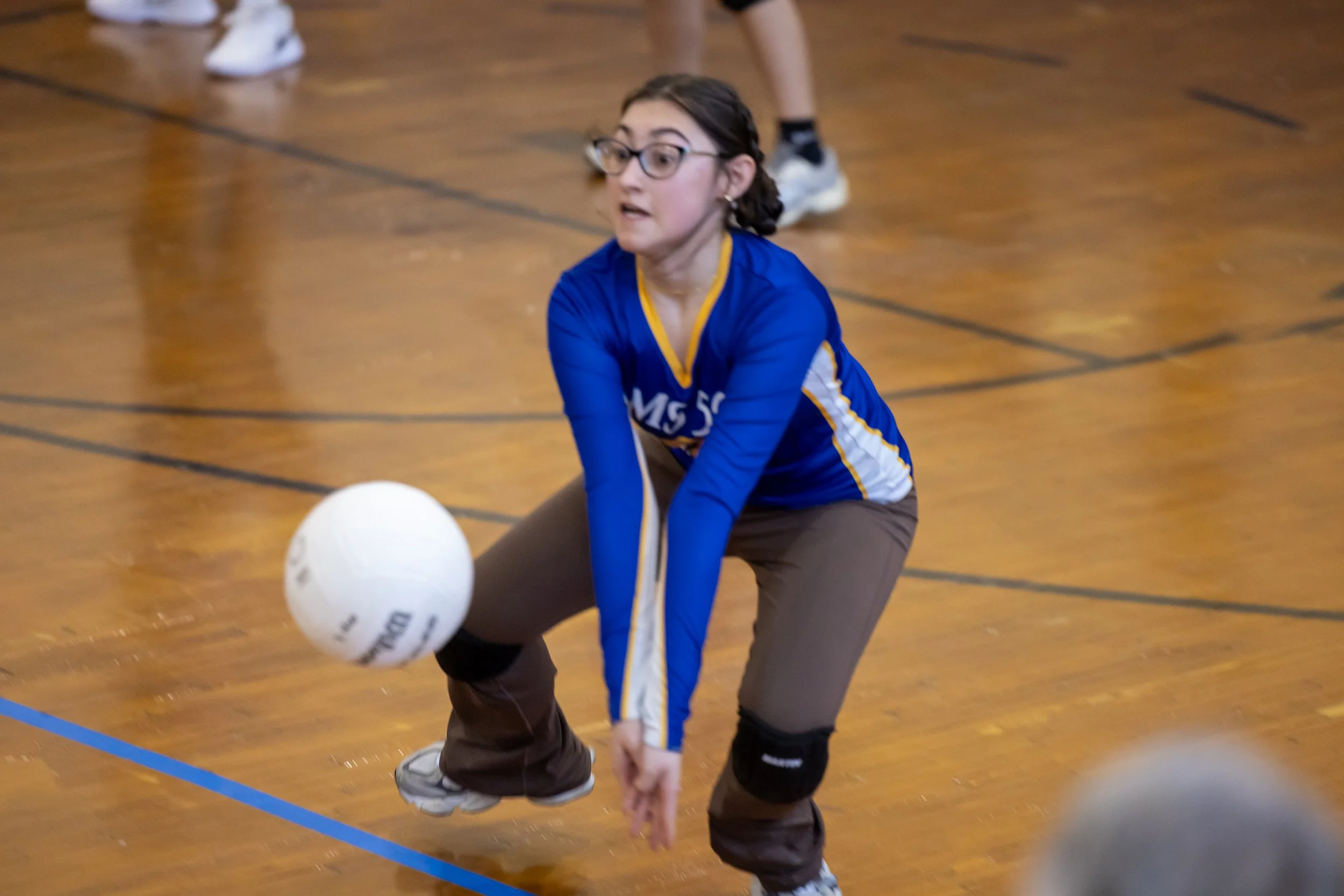 MS 50 students playing volleyball