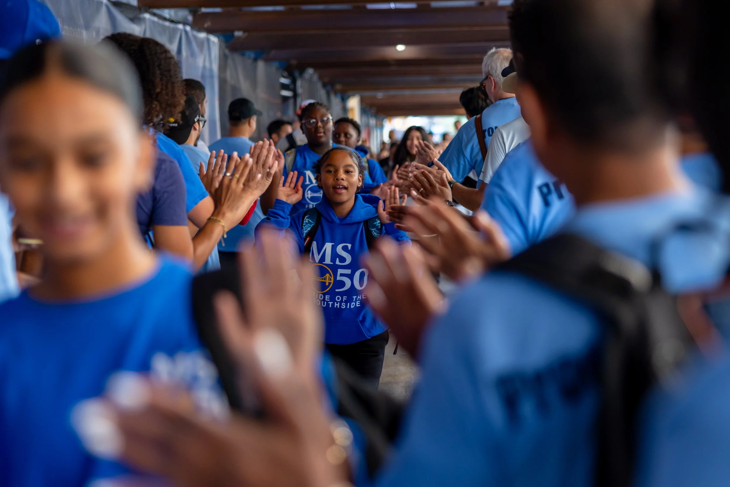 Students get high fives from parents