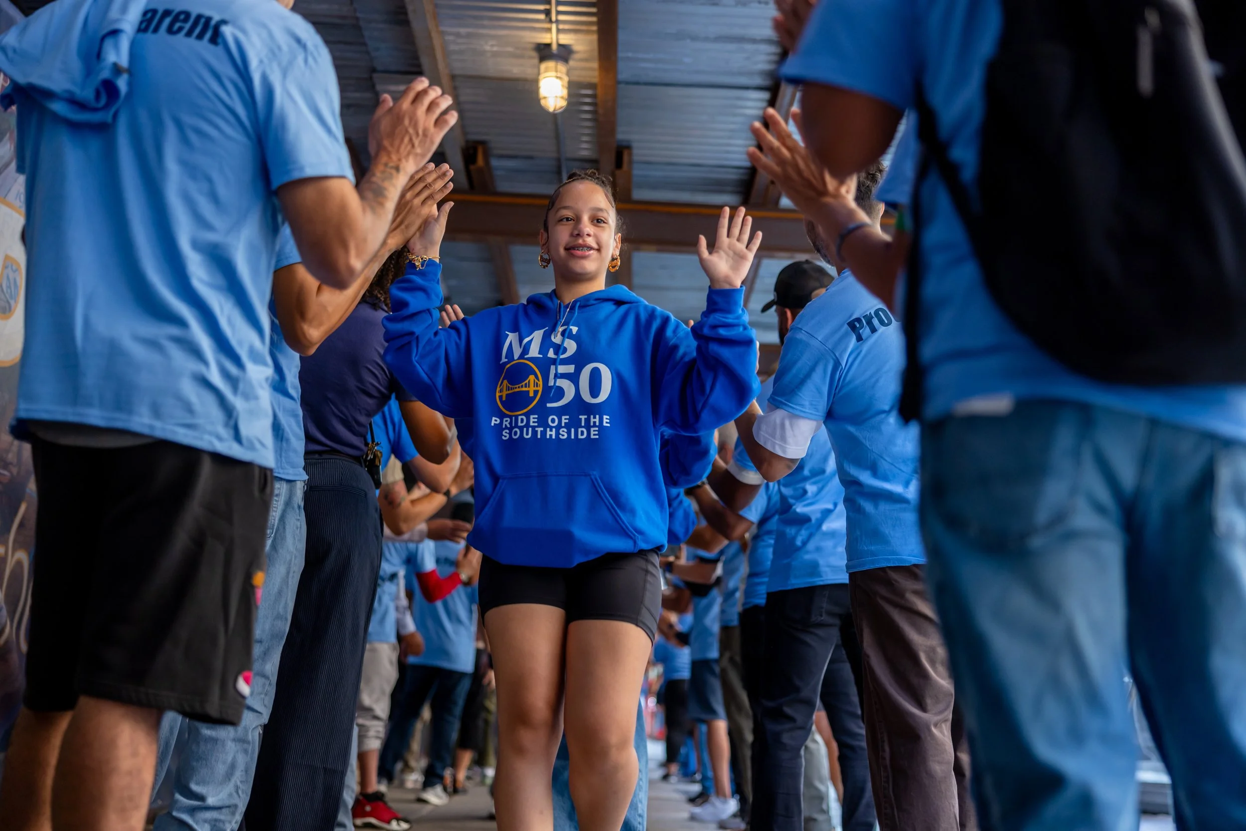 Students get high fives from parents