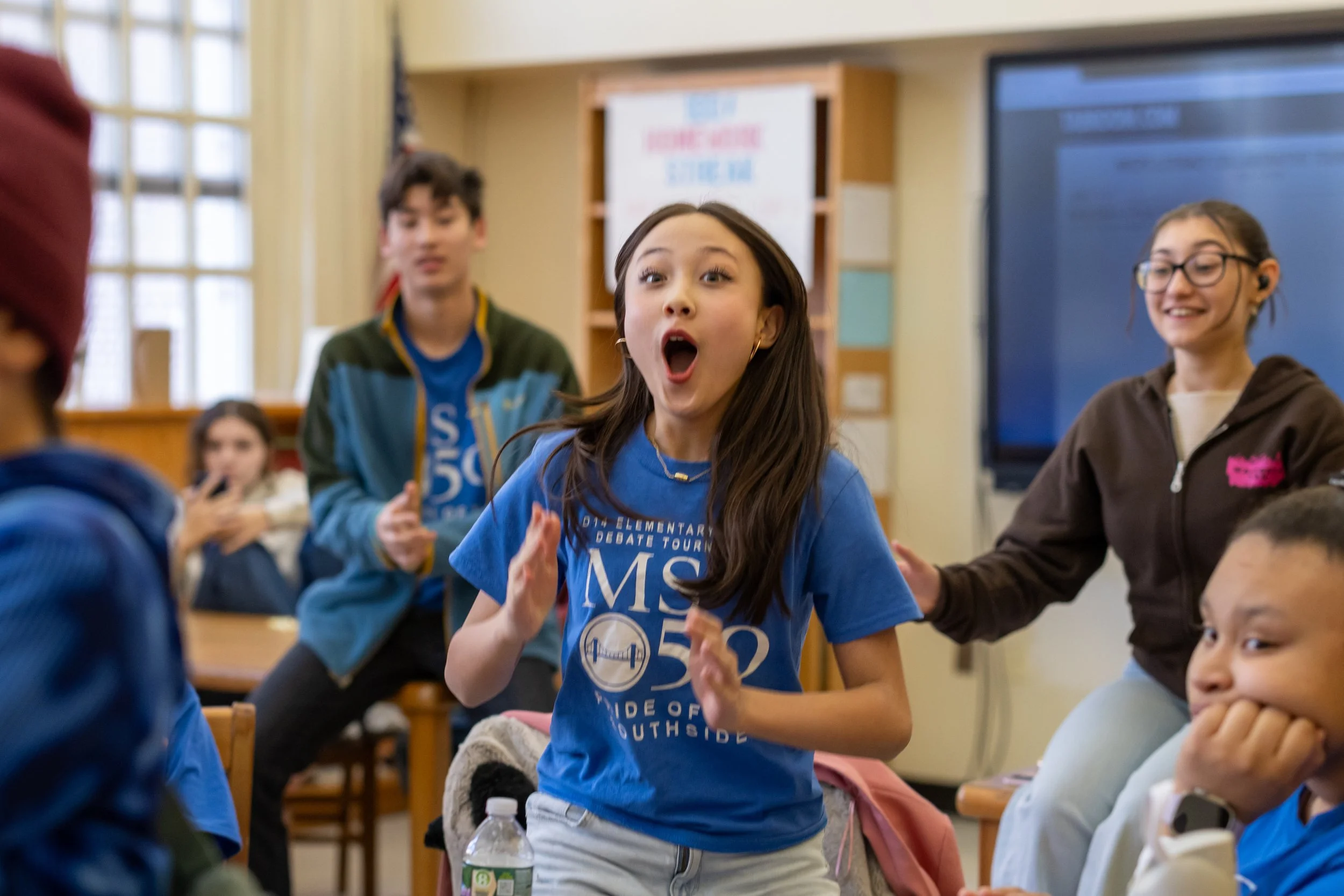 Debaters celebrate their wins