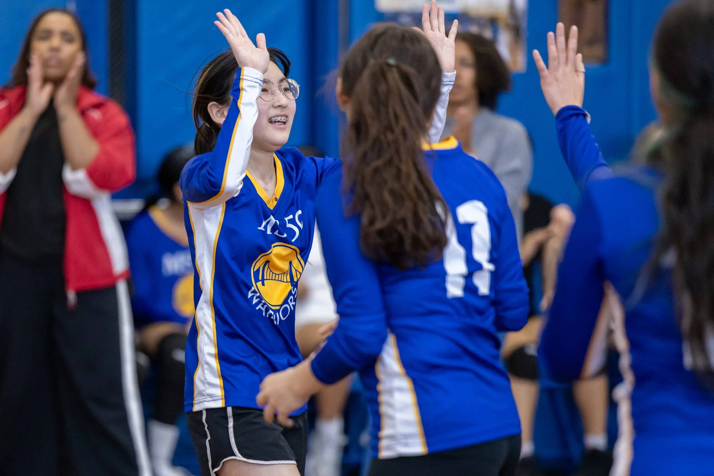 MS 50 students playing volleyball