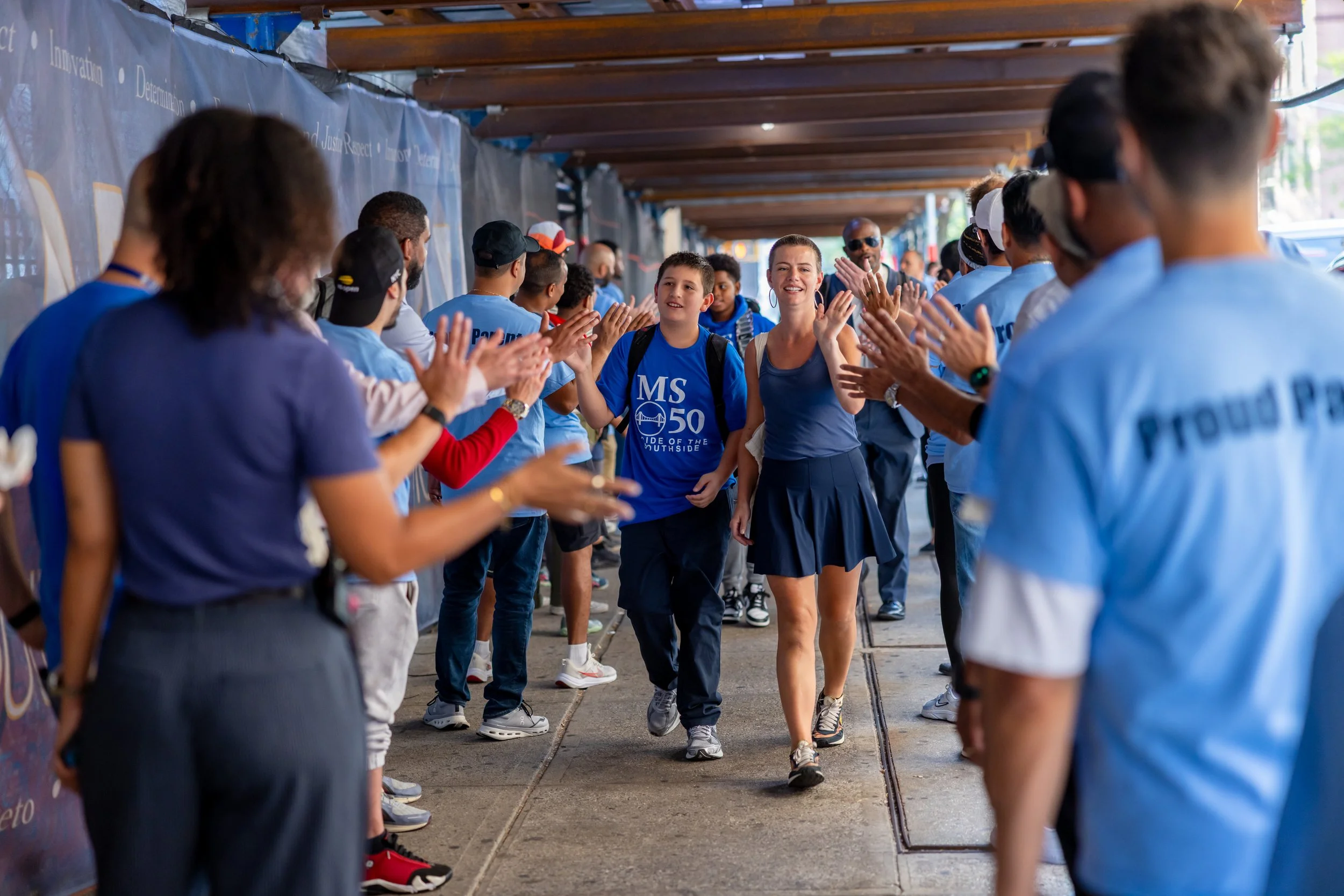 Students get high fives from parents