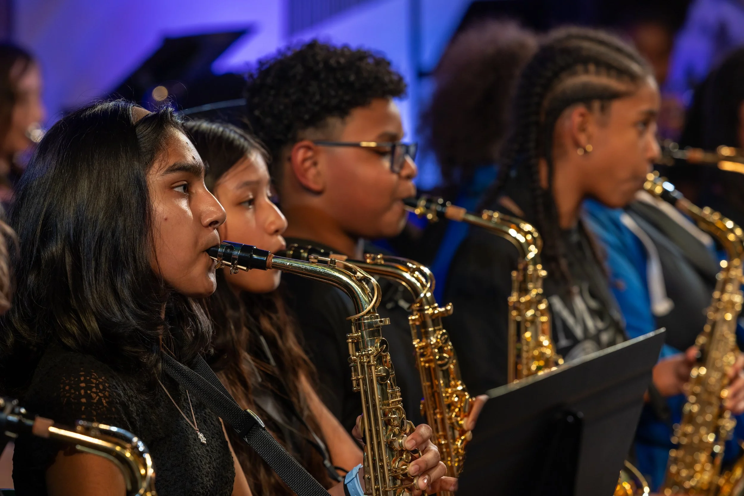 middle school students perform in band concert