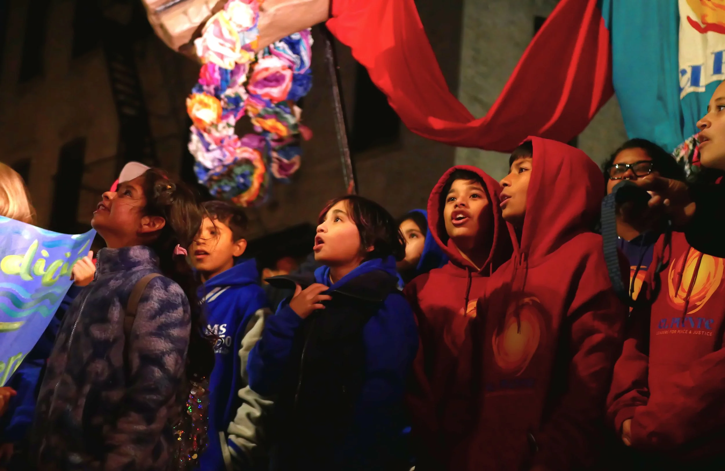 Students sing to little Amal 