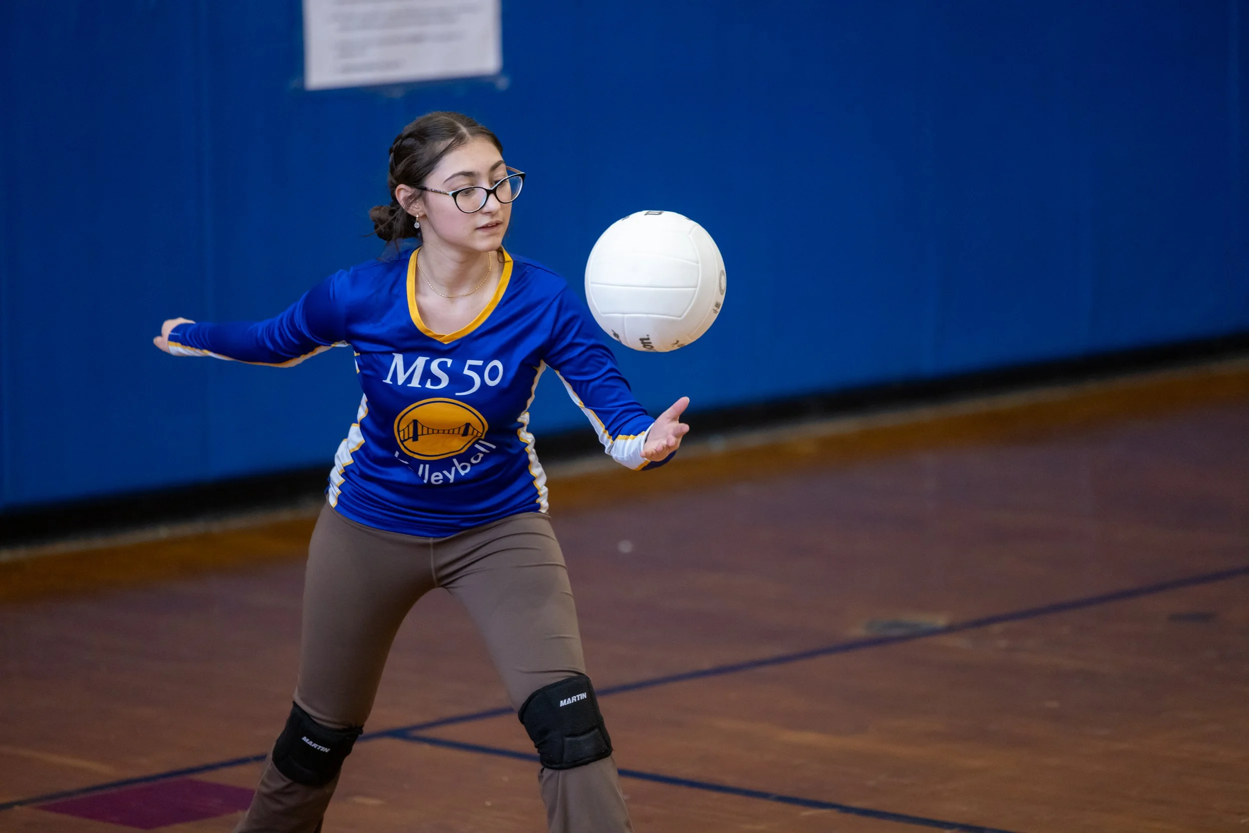 MS 50 students playing volleyball