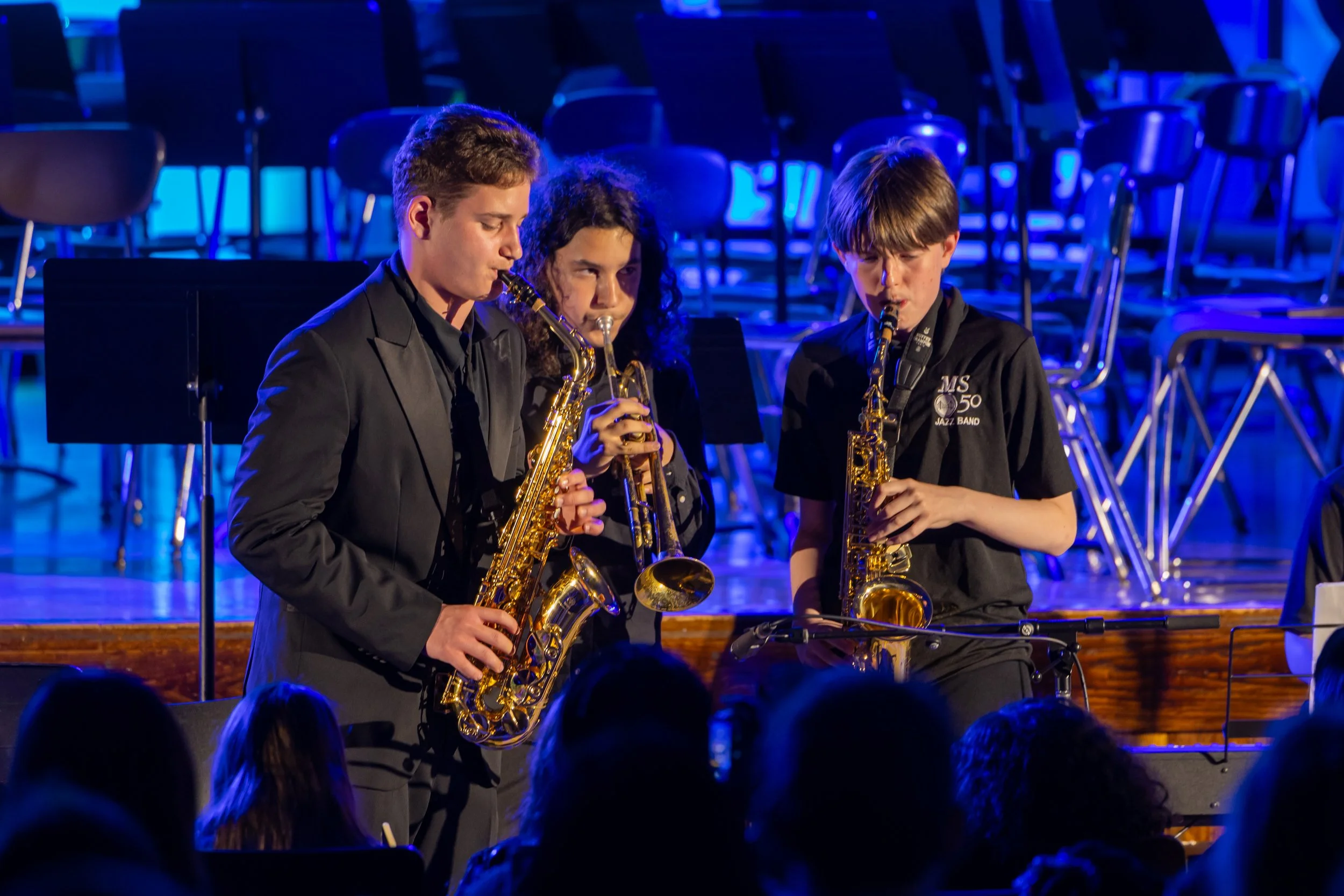 middle school students perform in band concert