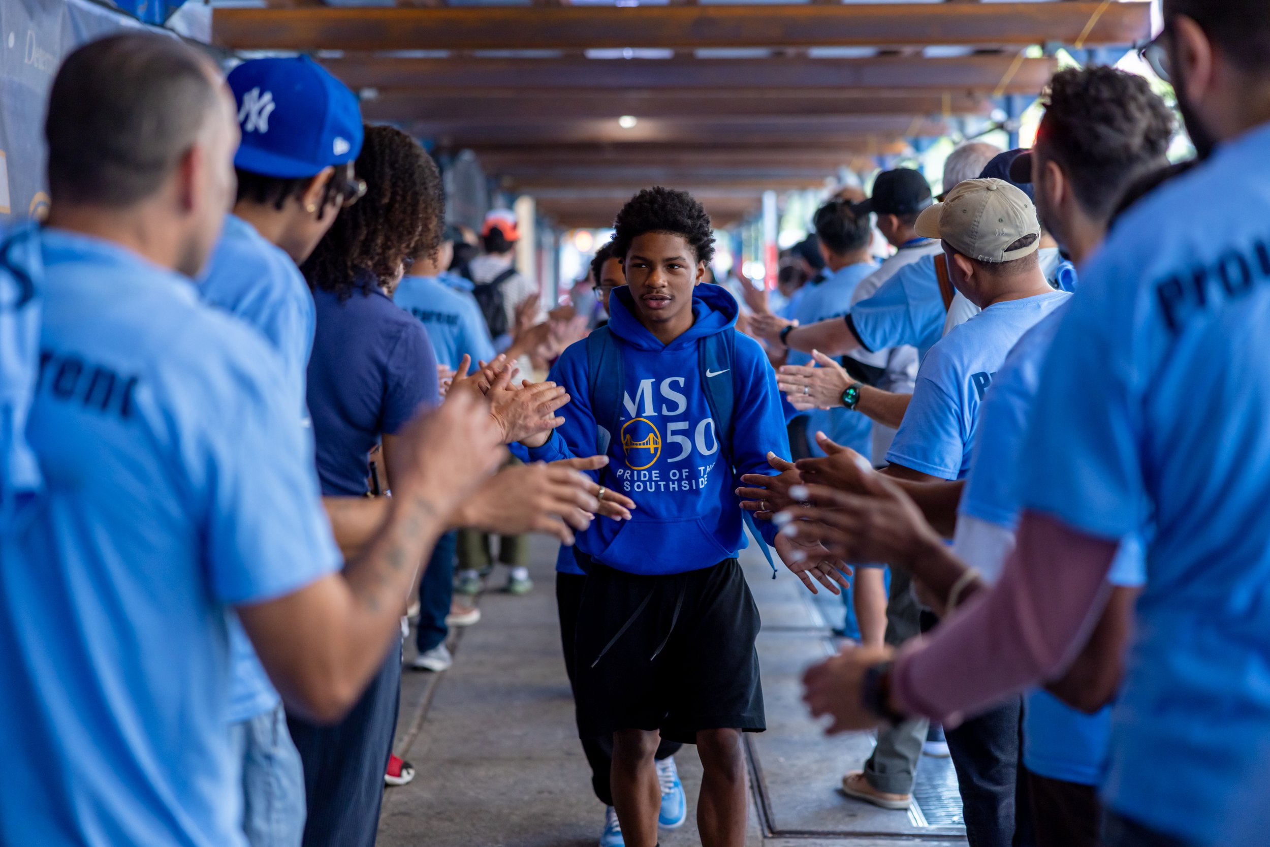 Students get high fives from parents