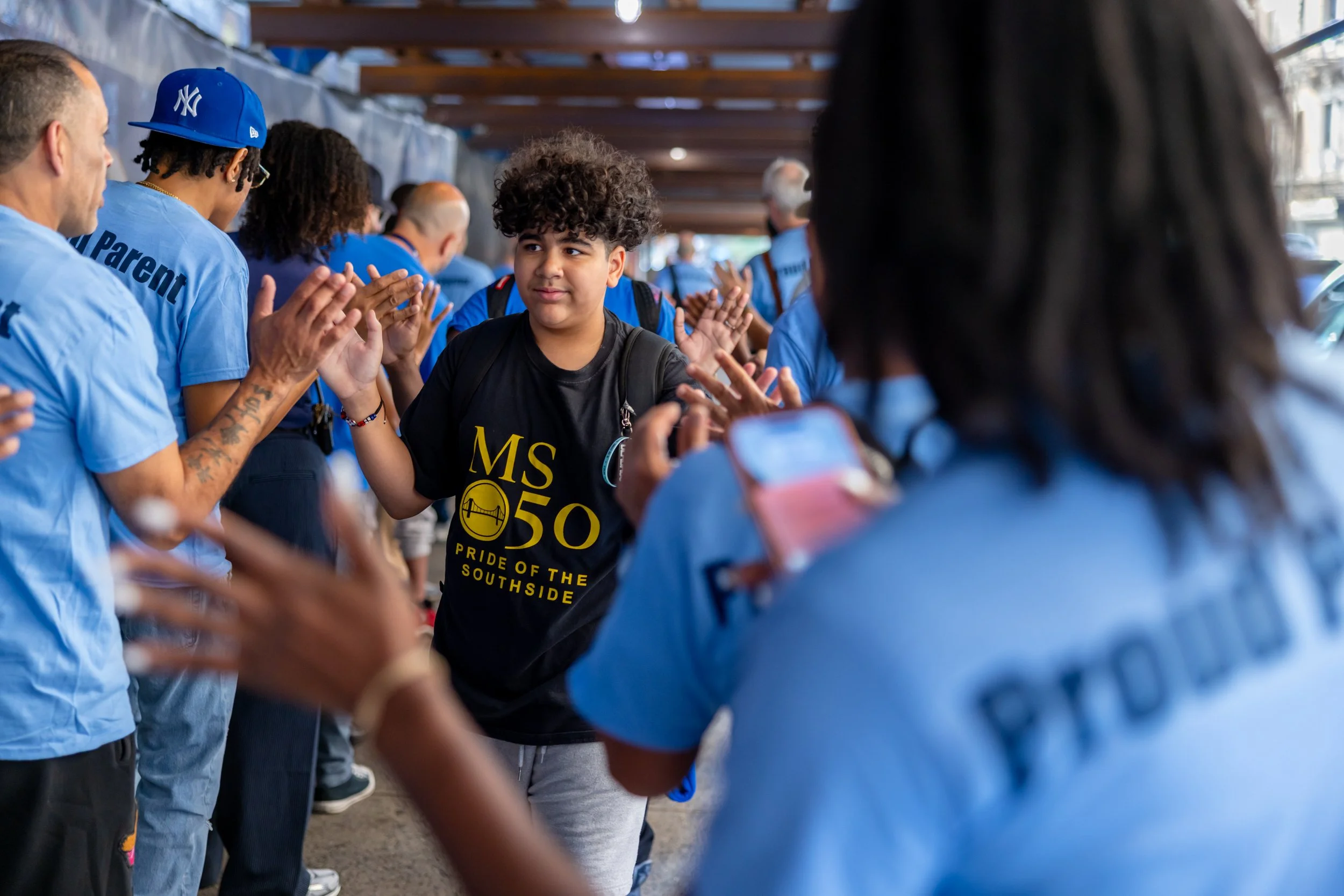 Students get high fives from parents