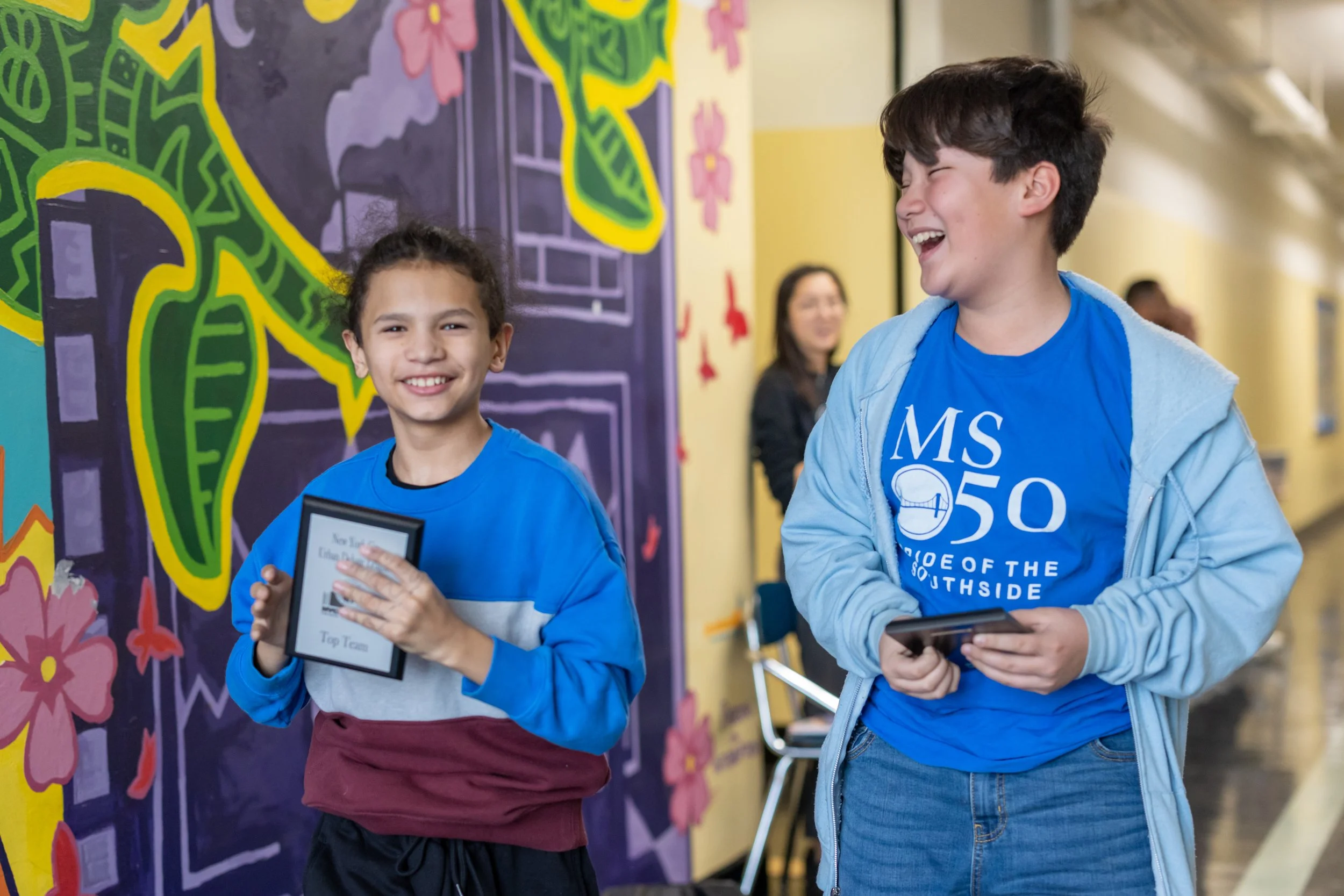 Debaters celebrate their wins