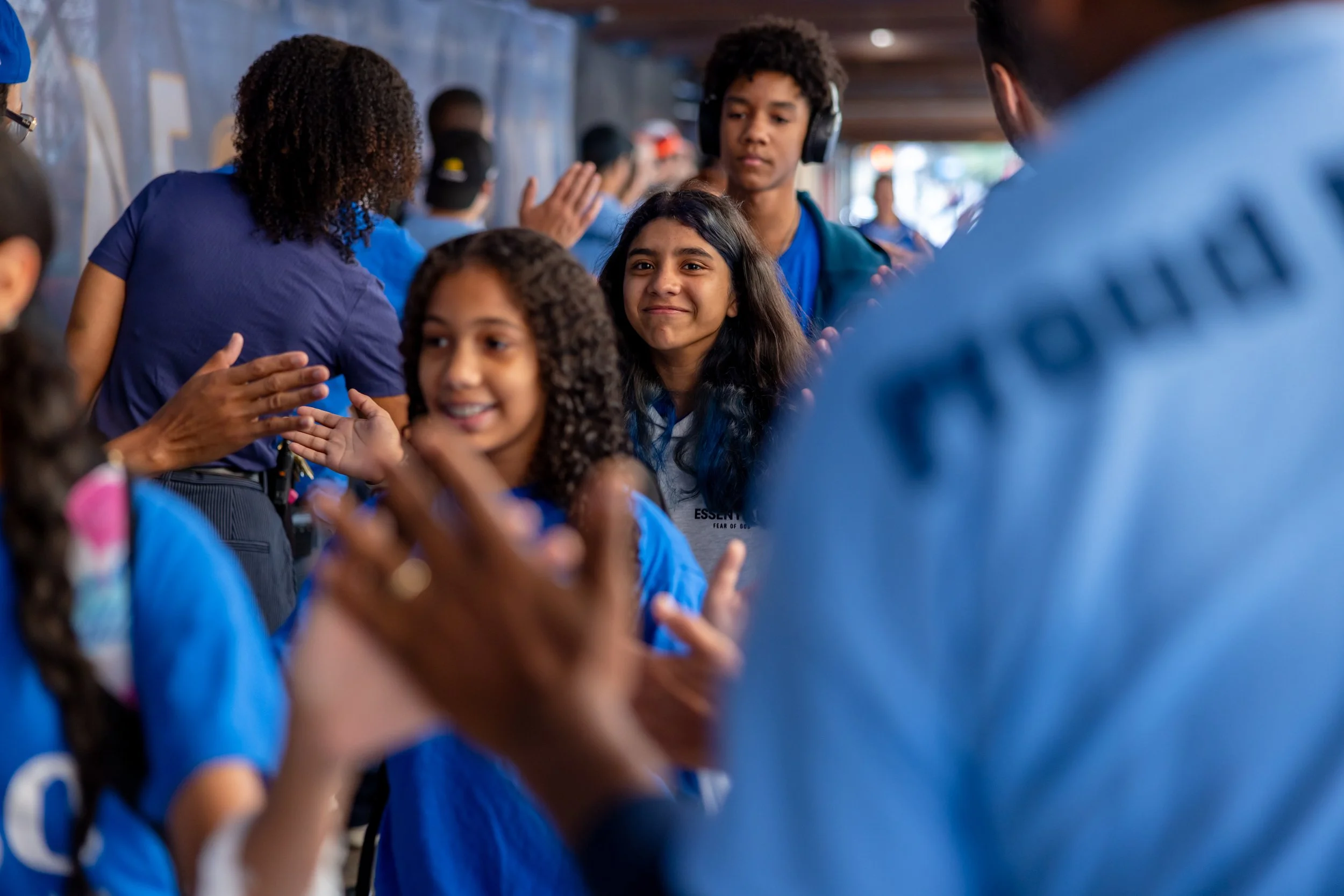 Students get high fives from parents