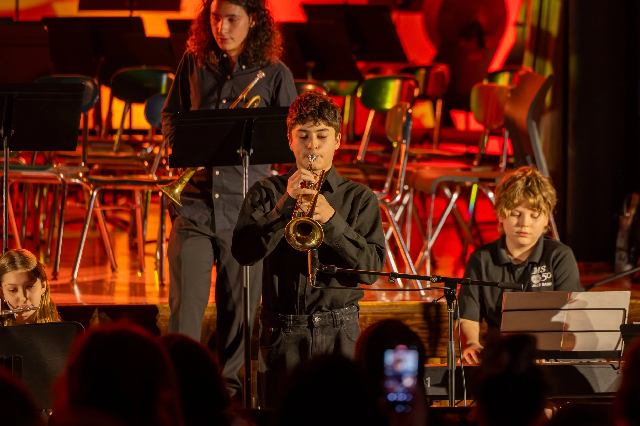 middle school students perform in band concert