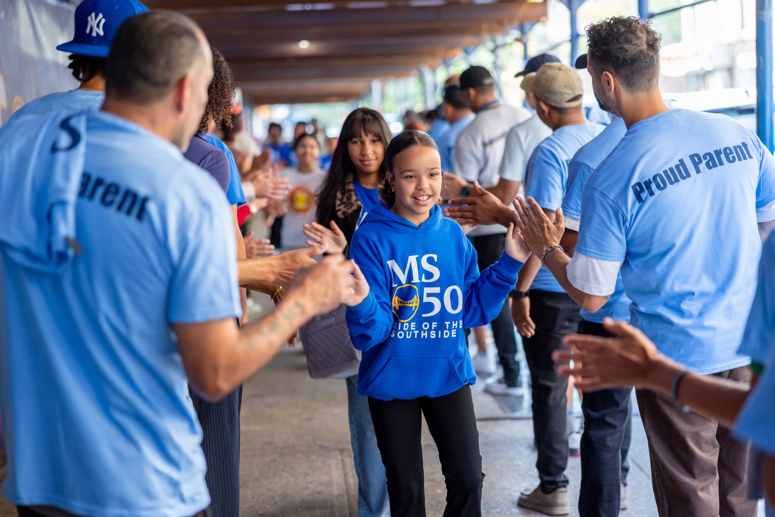 Students get high fives from parents