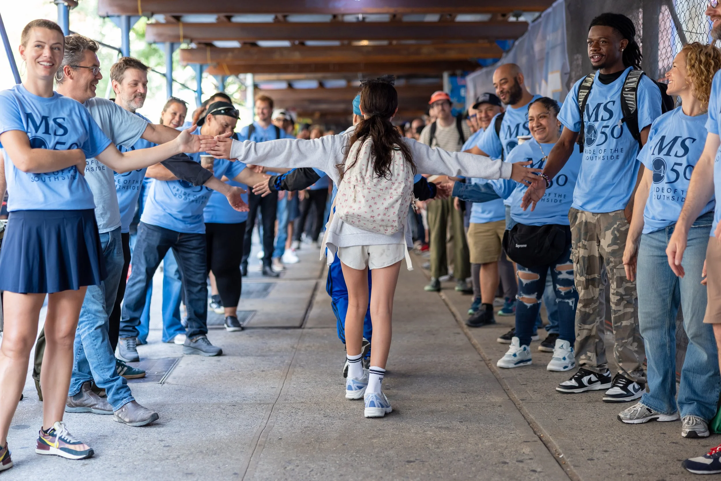 Students get high fives from parents