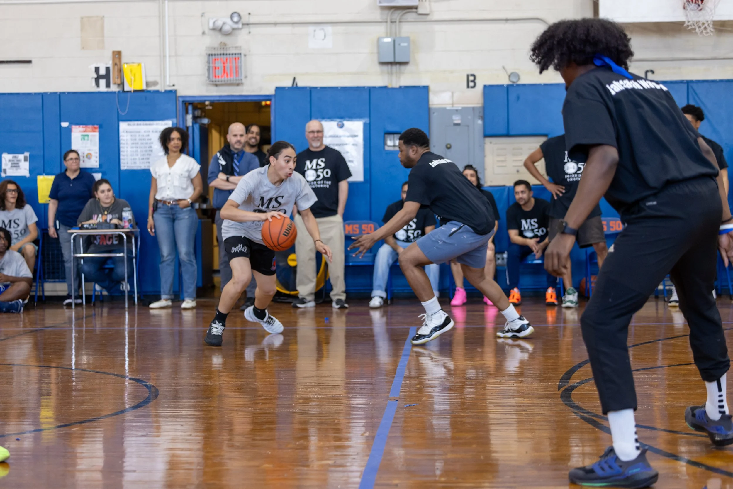 student versus staff basketball game