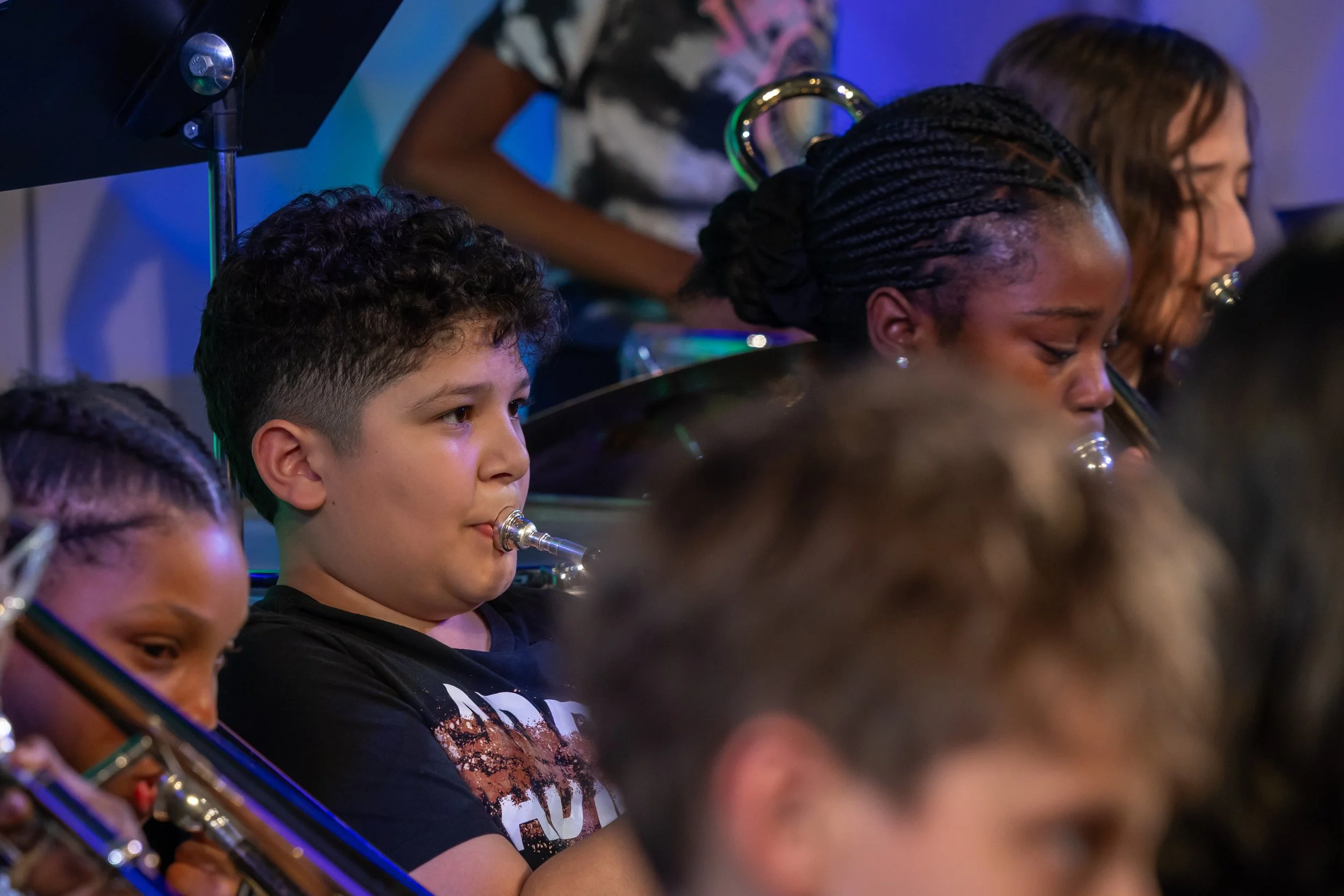 middle school students perform in band concert