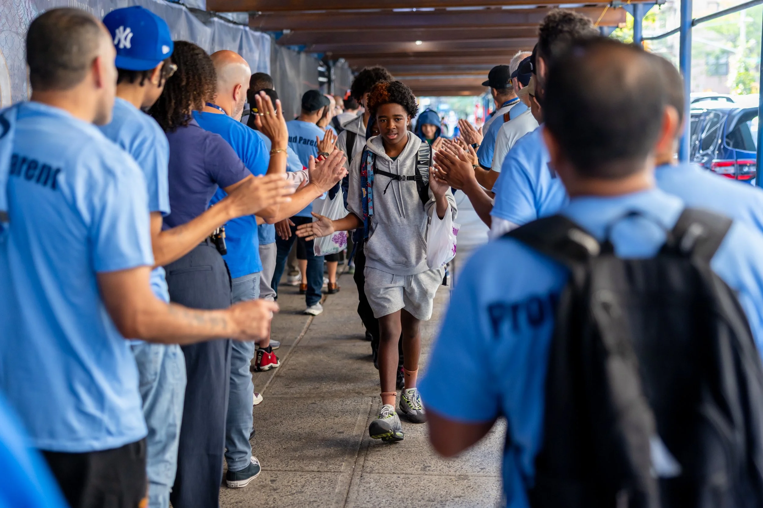 Students get high fives from parents