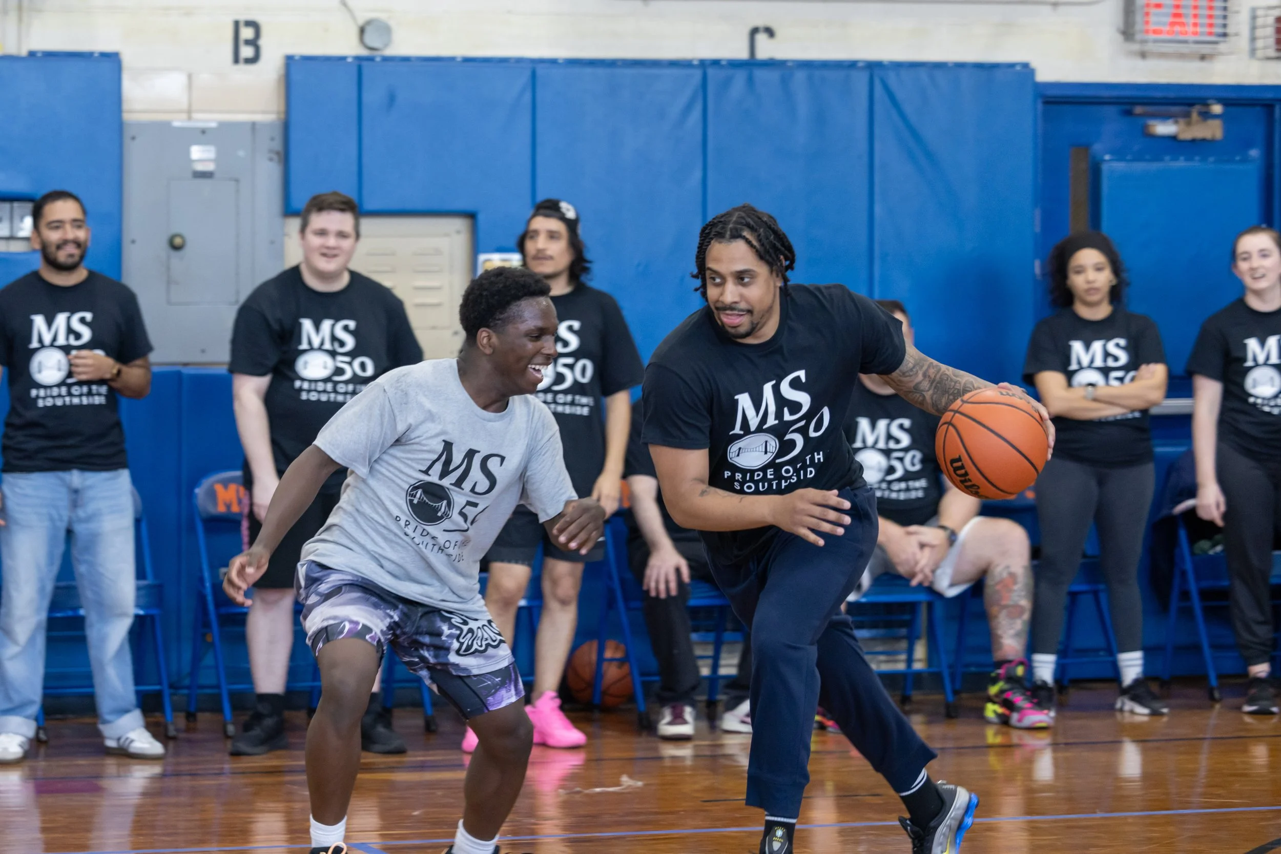 student versus staff basketball game