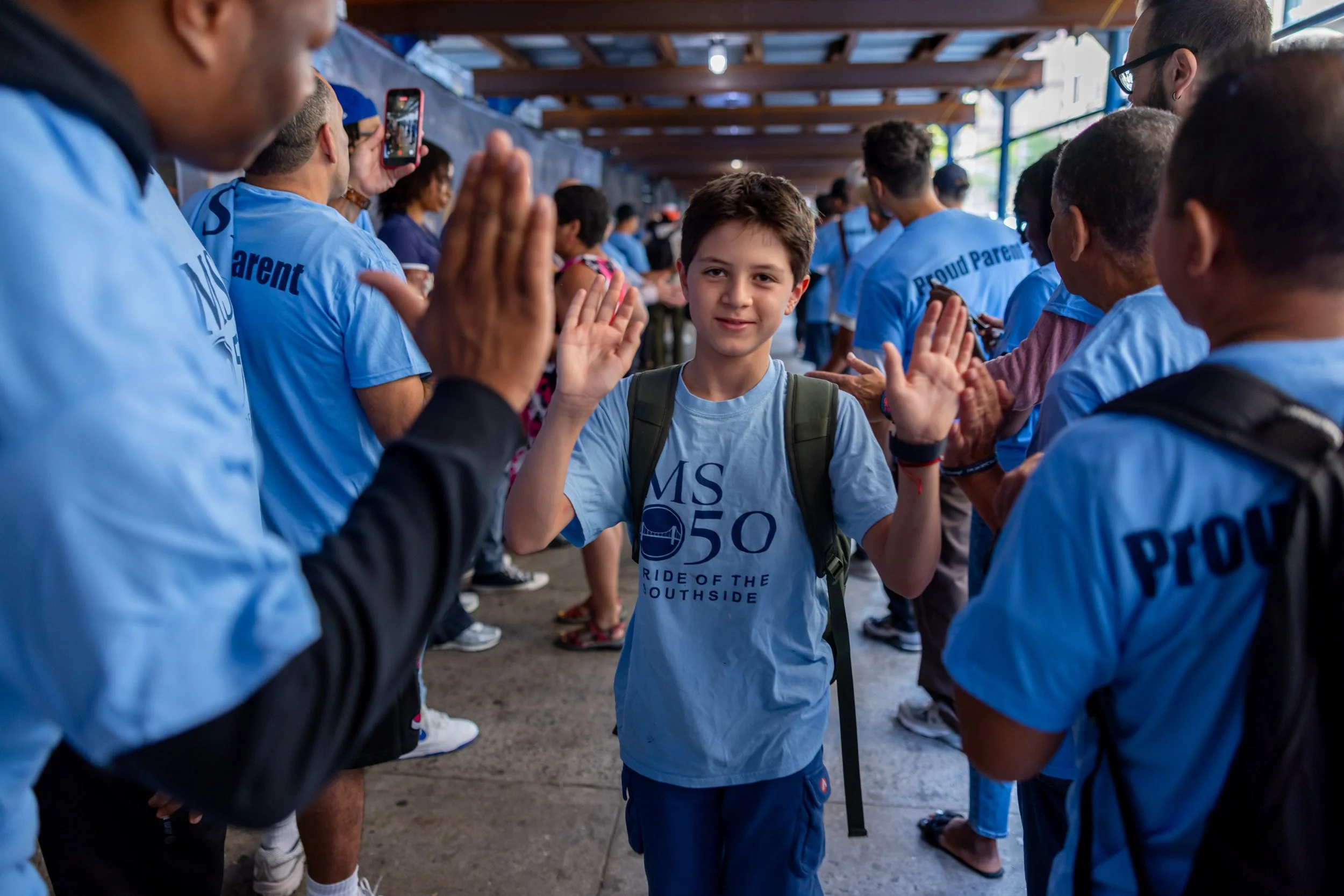 Students get high fives from parents